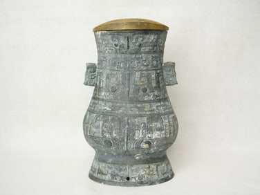 An Ancient Chinese Bronze Hu-Form Vase