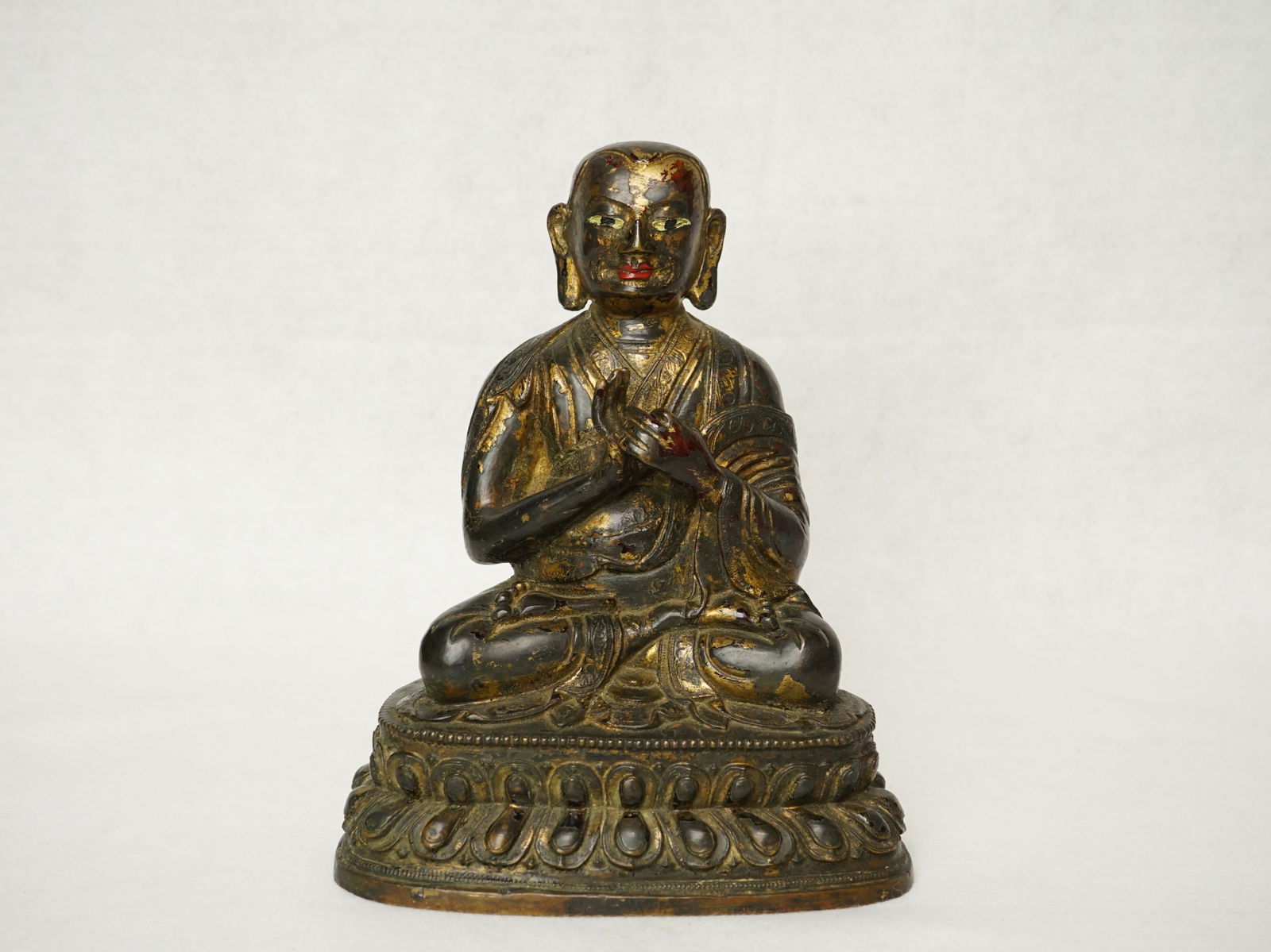 A Tibetan Gilt Bronze Figure of A Seated Buddha (1 of 8)