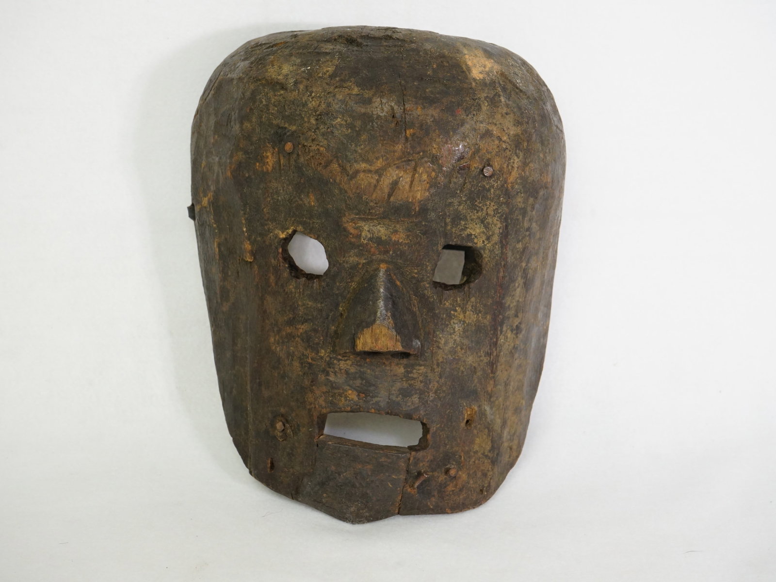 Antique Nepali Tribal Mask: Approximate size:9x7x4.5 in Shipping: We offer in-house shipping services for most small items. This means that we will take care of packing and shipping the items directly to you. For larger or speci