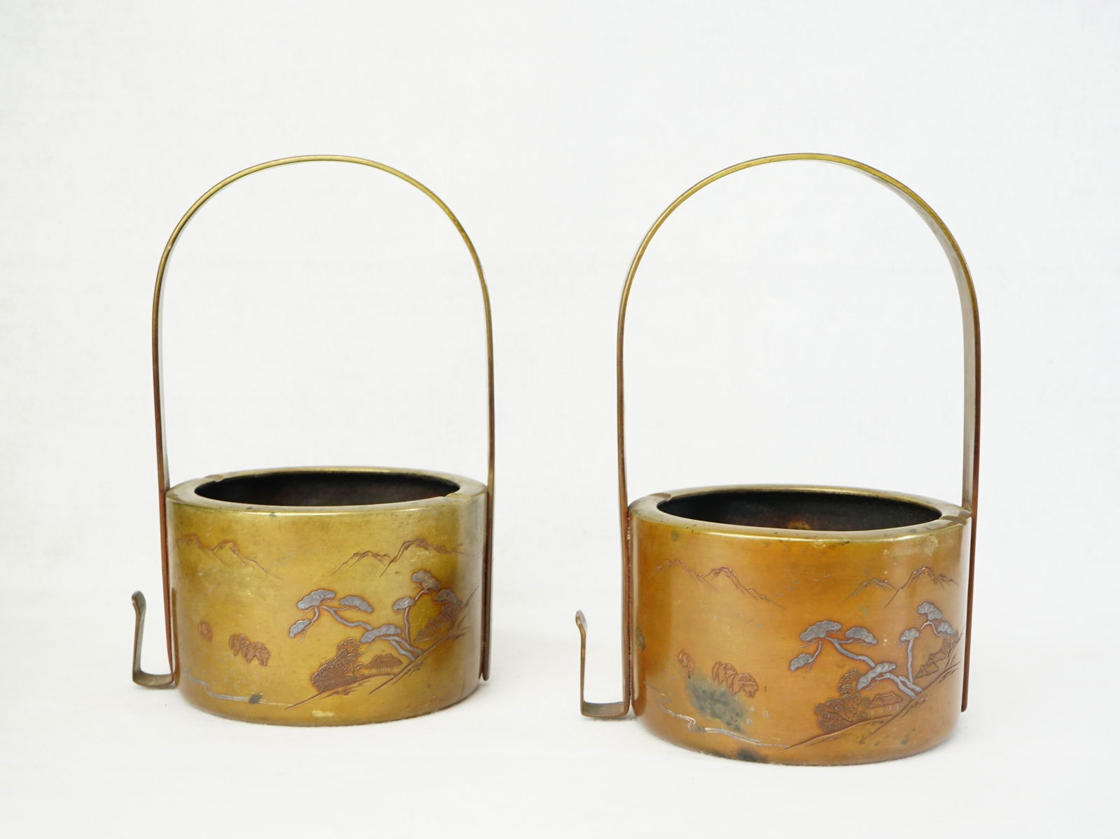Pair of Japanese Bronze Baskets With Silver Inlay, Meiji Period: Approximate size: 9.5x5.75x6.5 in Shipping: We offer in-house shipping services for most small items. This means that we will take care of packing and shipping the items directly to you. For larger or