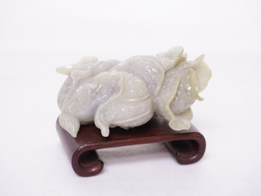 Chinese Carved Jadeite 'Cabbage' ornament With Wood Stand, Qing Dynasty