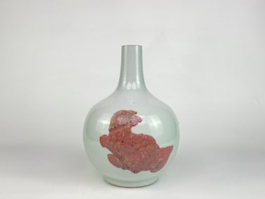 A Copper-Red-Decorated 'Buddhist Lions' Bottle Vase