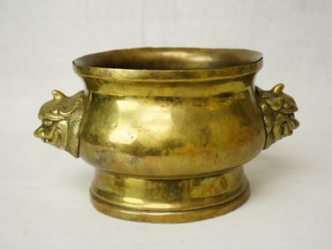 A Chinese Bronze Twin Mask Censer With Lion Head Handles