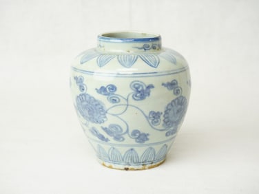A Chinese Ming Style Blue and White Jar With Floral Design