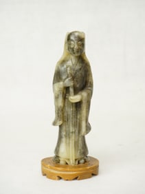 A Chinese Carved Stone Figure