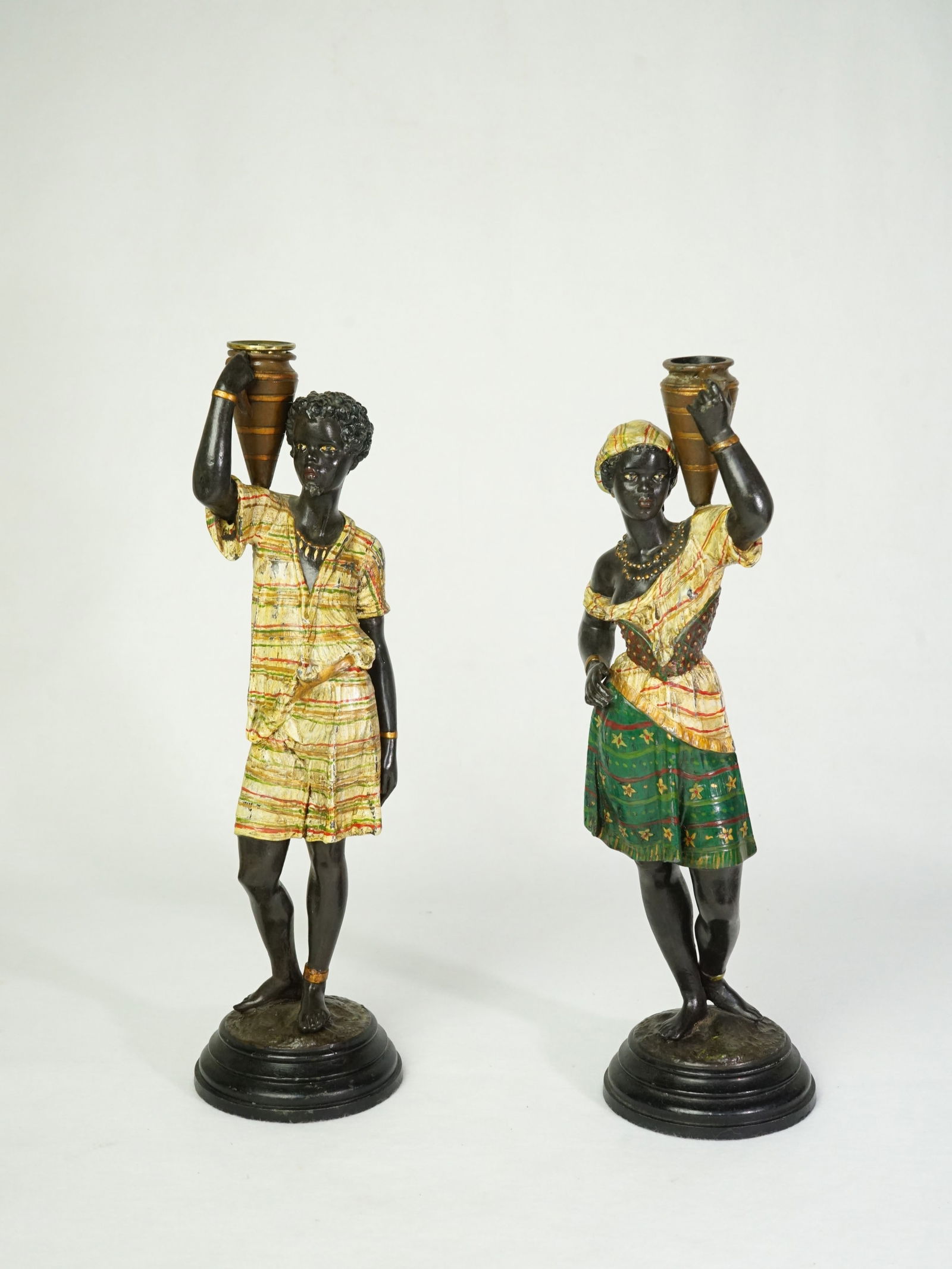 Louis Hottot Blackamoor Bronze Candlesticks: Approximate size:14.5x4.5x4.5 in Shipping: We offer in-house shipping services for most small items. This means that we will take care of packing and shipping the items directly to you. For larger or