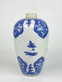 A Blue and White Ovoid Jar With Flower Scrolls