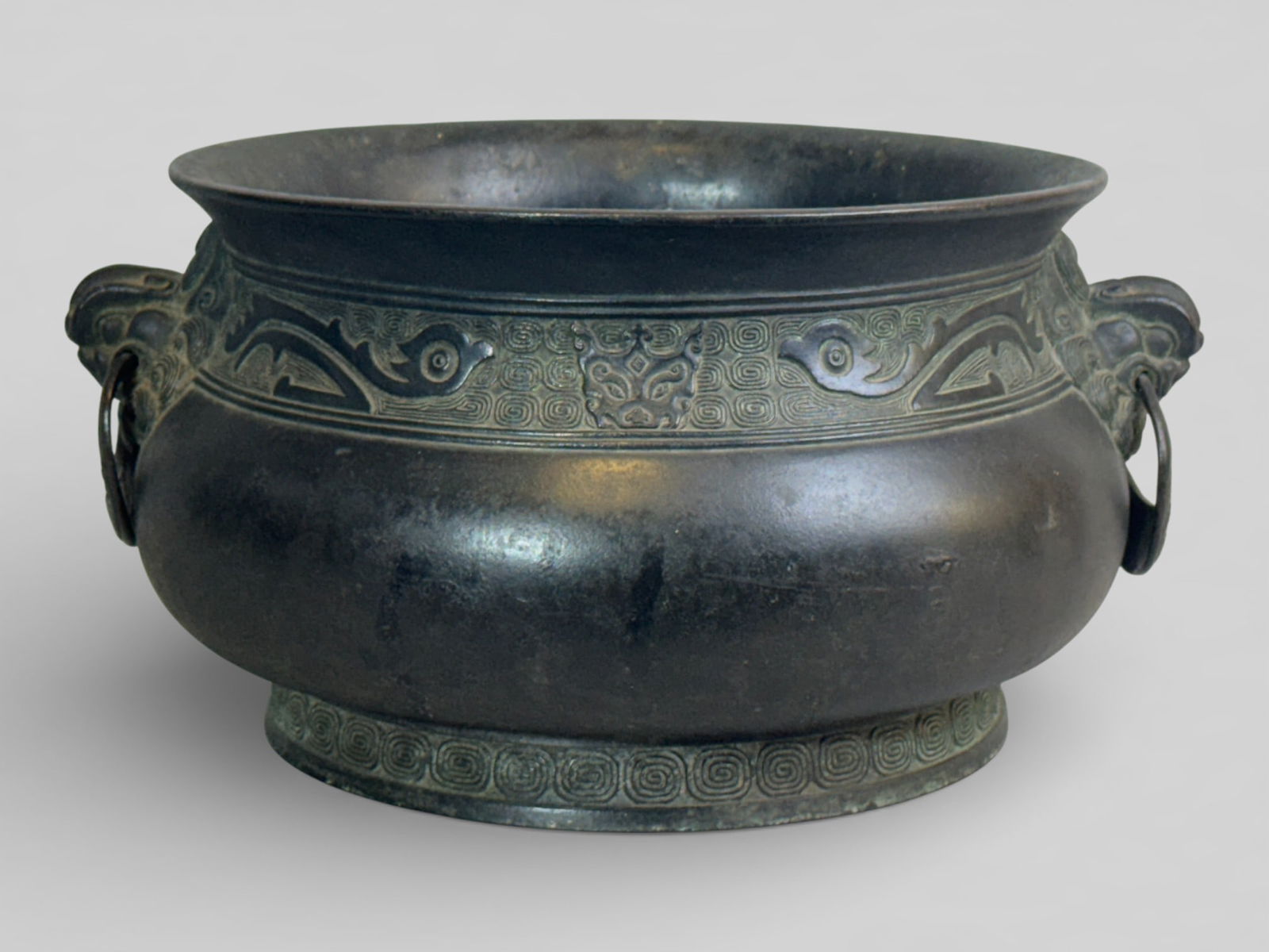 Chinese Ming Bronze Censer With Lionmask Handle: Chinese bronze censer with lionmask handle, 13"w, one side has old shallow dents,bottom with six character mark Shipping: We offer in-house shipping services for most small items. This means that we w