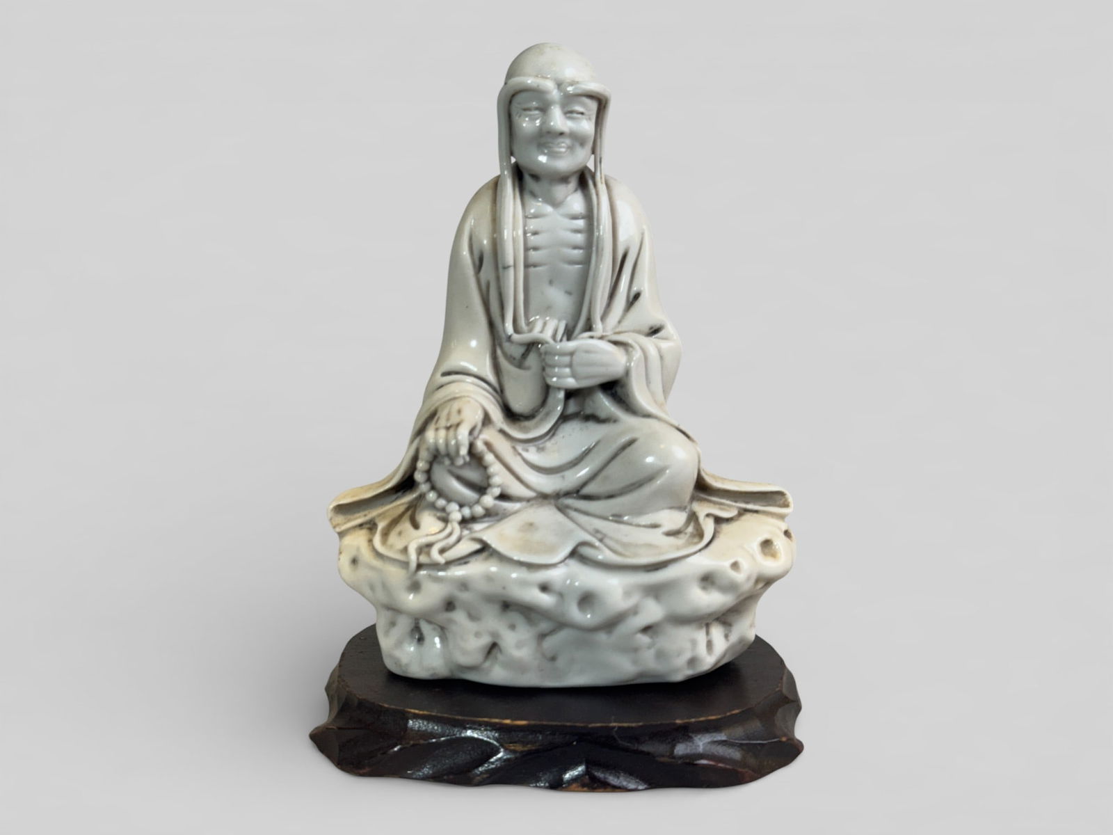 Chinese Dehua Porcelain Figure of A Lohan With Wood Stand (1 of 9)