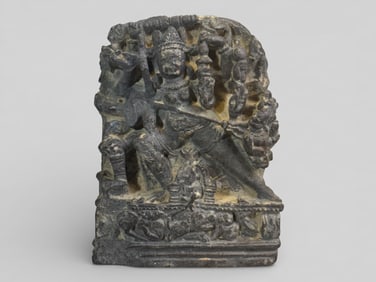 A Tibetan Carved Black Stone Diety
