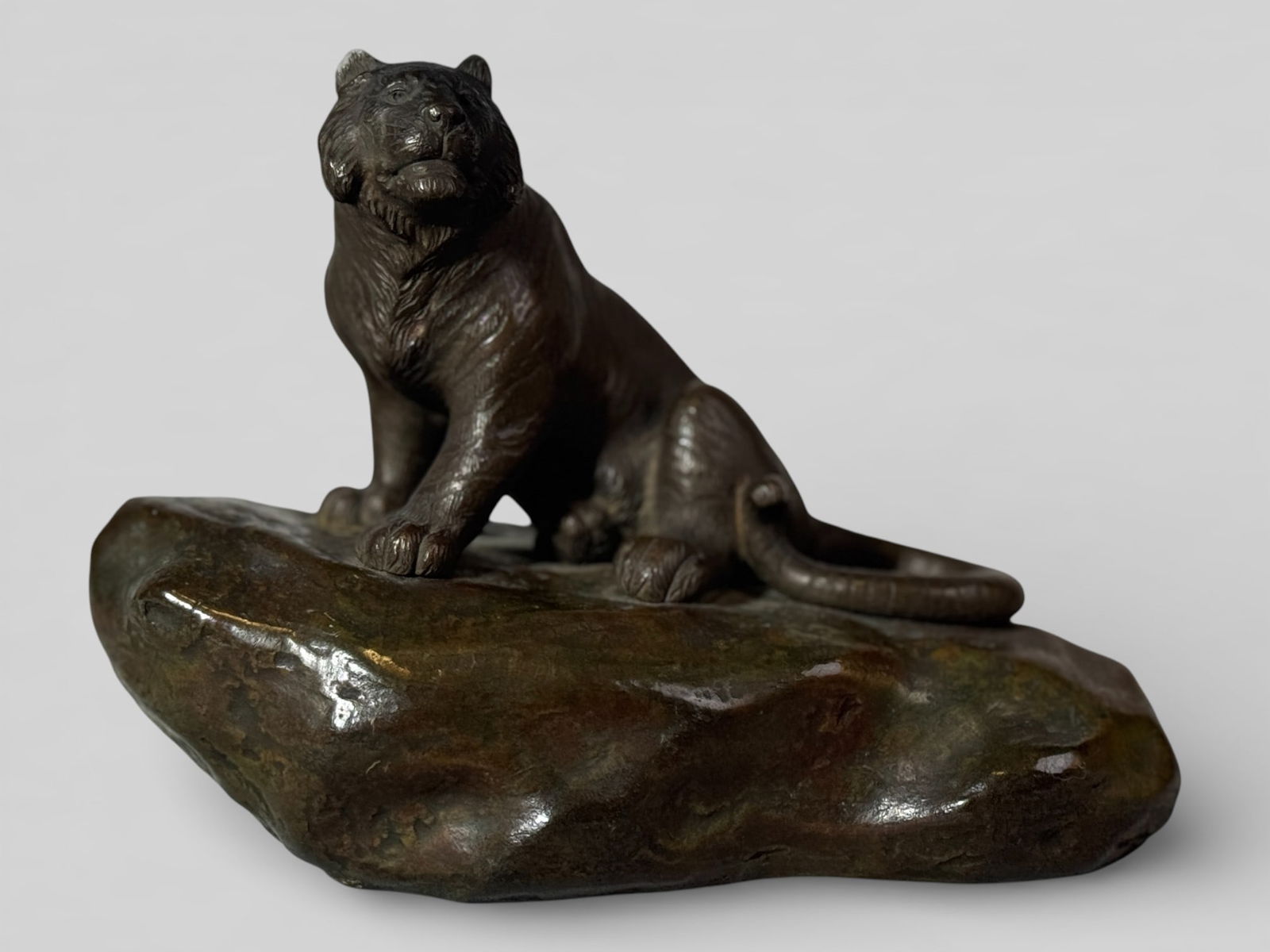 Japanese Signed Meiji Bronze Tiger,Meiji Period: Japanese meiji bronze tiger on rock, signed with incised mark, 7.25"w 5"ht Shipping: We offer in-house shipping services for most small items. This means that we will take care of packing and shipping
