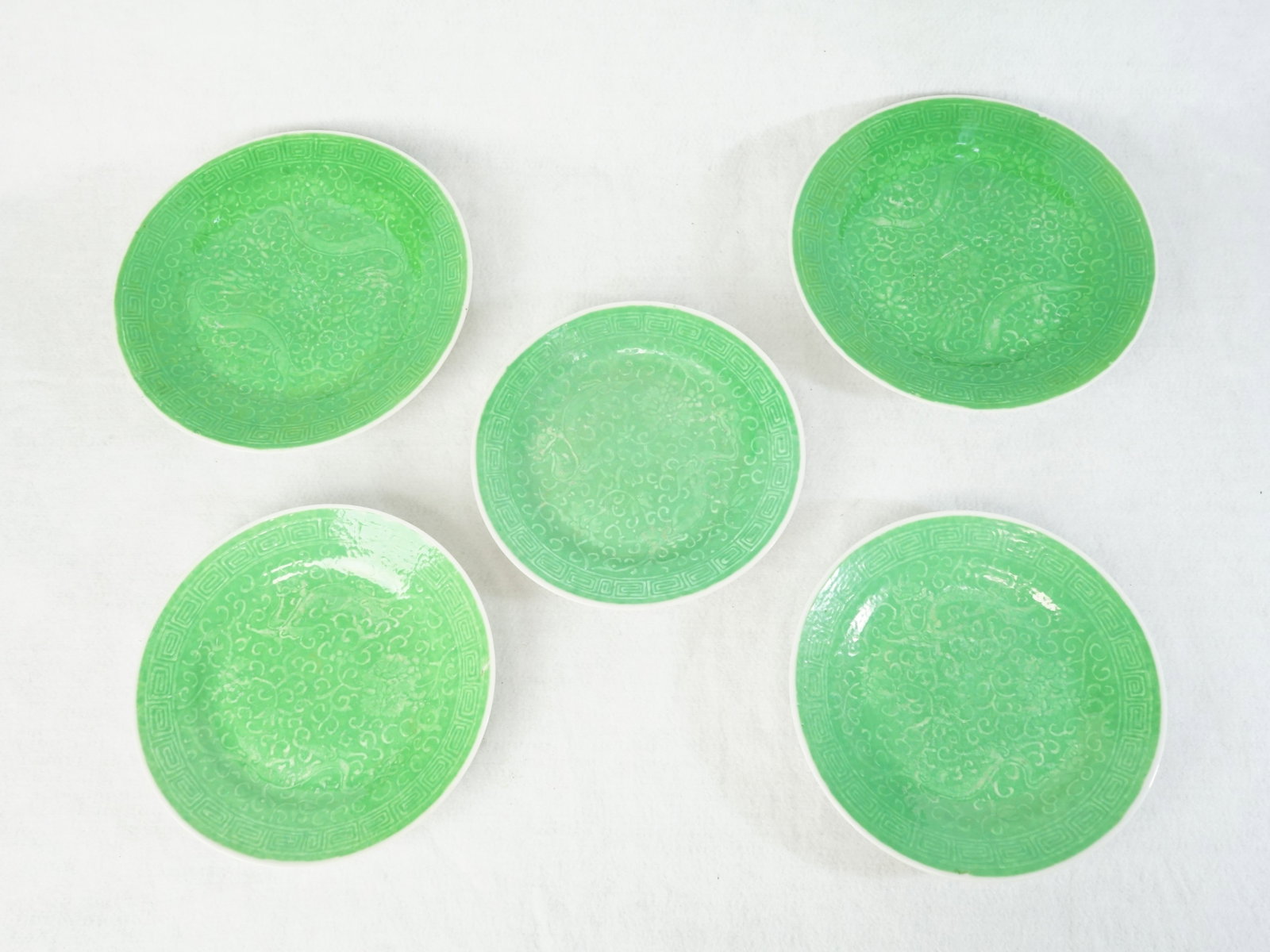 Lot of 5 Chinese Green Glazed Plates,Early 20th Century: Approximate size:dia 7.75 in(2 )/6.75 in(3) Shipping: We offer in-house shipping services for most small items. This means that we will take care of packing and shipping the items directly to you. For