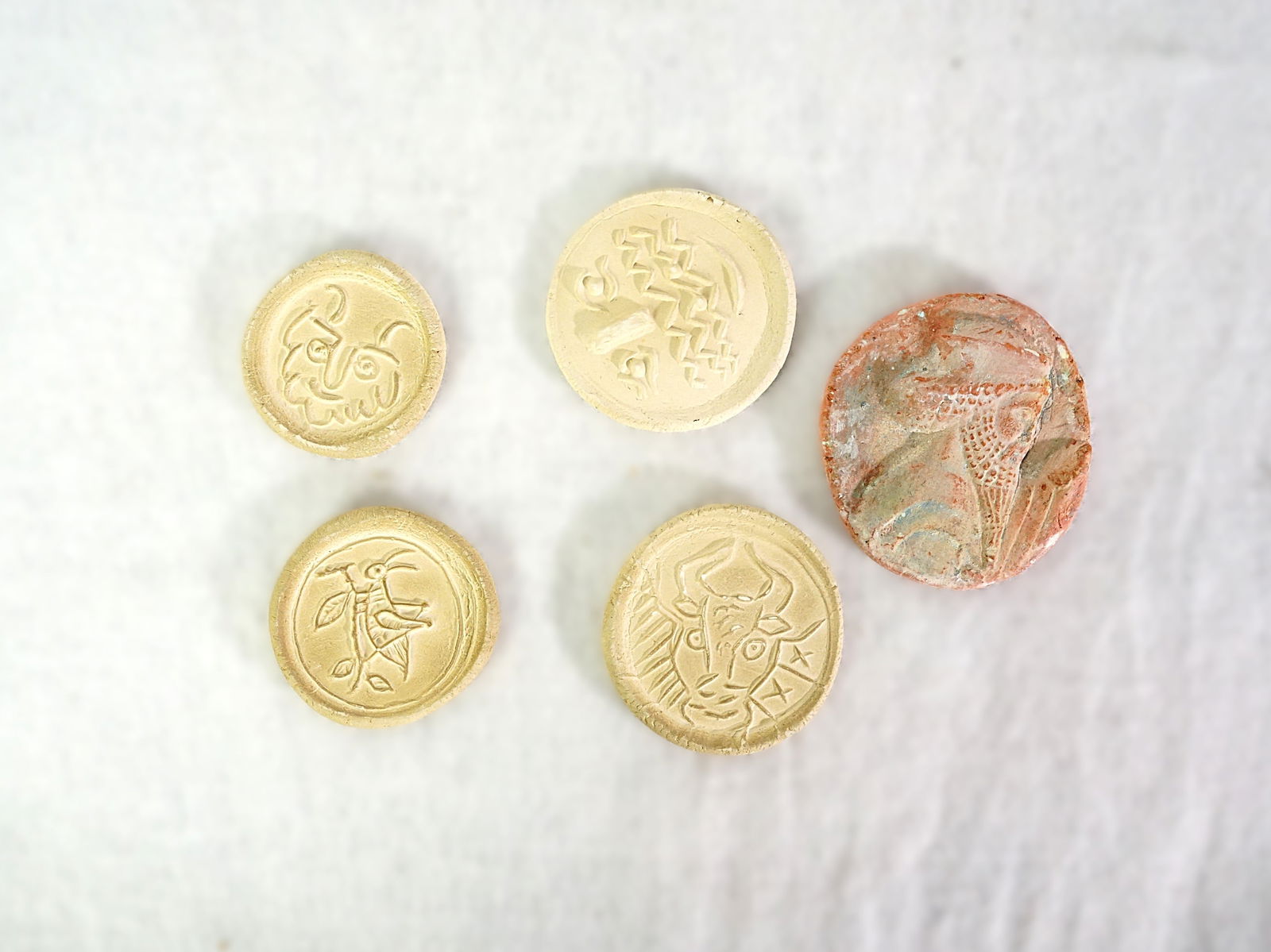 Five Hand-Formed Clay Medallions: Approximate size:dia 1.5-2.25 in Shipping: We offer in-house shipping services for most small items. This means that we will take care of packing and shipping the items directly to you. For larger or