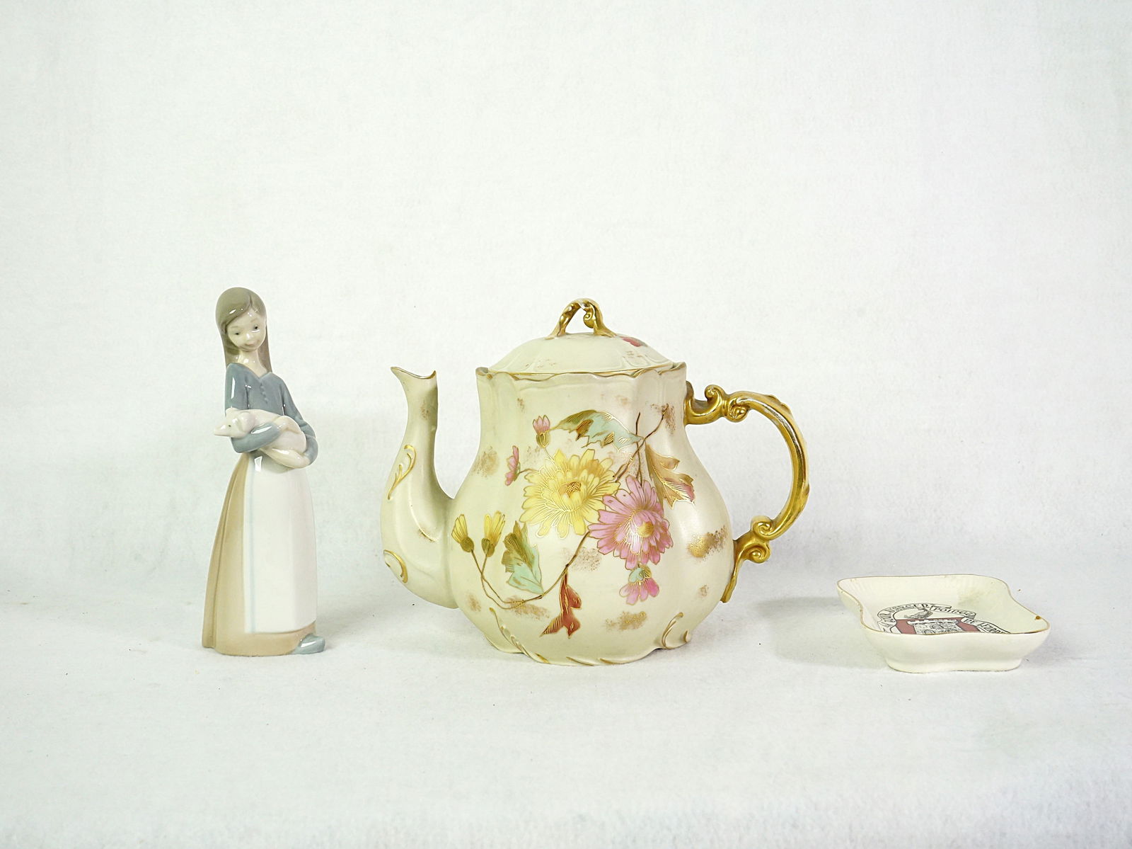 Antique Royal Worcester Blush Ivory Teapot and Lladro Figurine: Approximate size:teapot 8x7x6 in,figure H:6.75 in,dish 4x3 in Shipping: We offer in-house shipping services for most small items. This means that we will take care of packing and shipping the items di
