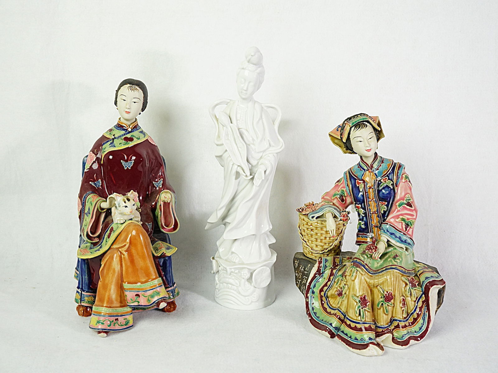 3 Chinese Porcelain Figurines: Approximate size: guanyin H:12 in,famille rose figures 10x7x5.5 in Shipping: We offer in-house shipping services for most small items. This means that we will take care of packing and shipping the ite