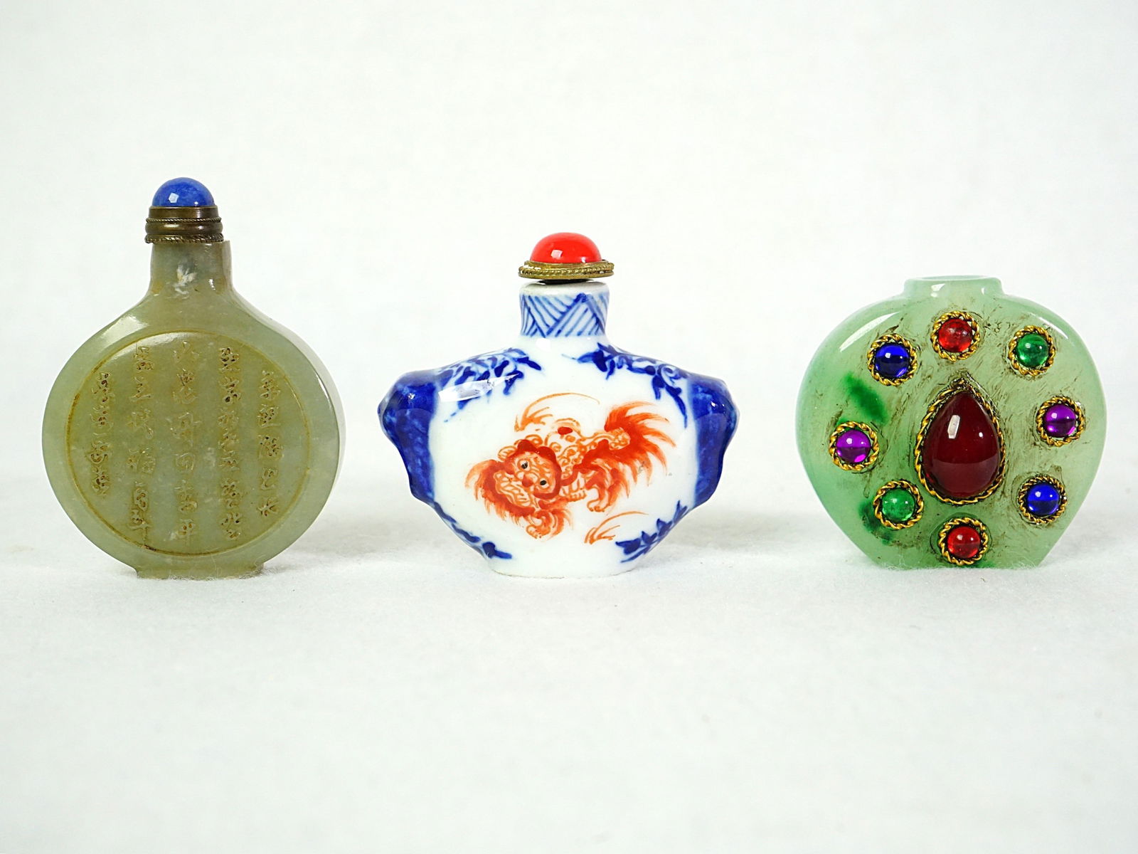 Group of Three Chinese Snuff Bottles: Approximate size:H:2-2.25 in Shipping: We offer in-house shipping services for most small items. This means that we will take care of packing and shipping the items directly to you. For larger or spec