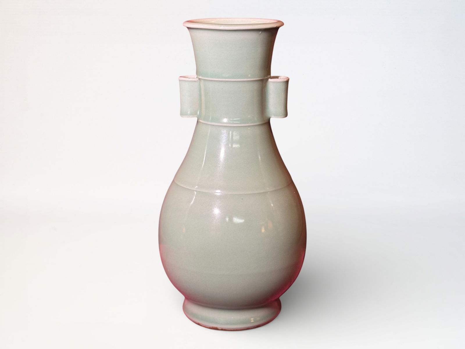 Chinese Celadon Glazed Arrow Vase: Chinese celadon porcelain vase with double handle, 11.75"ht Shipping: We offer in-house shipping services for most small items. This means that we will take care of packing and shipping the items dire