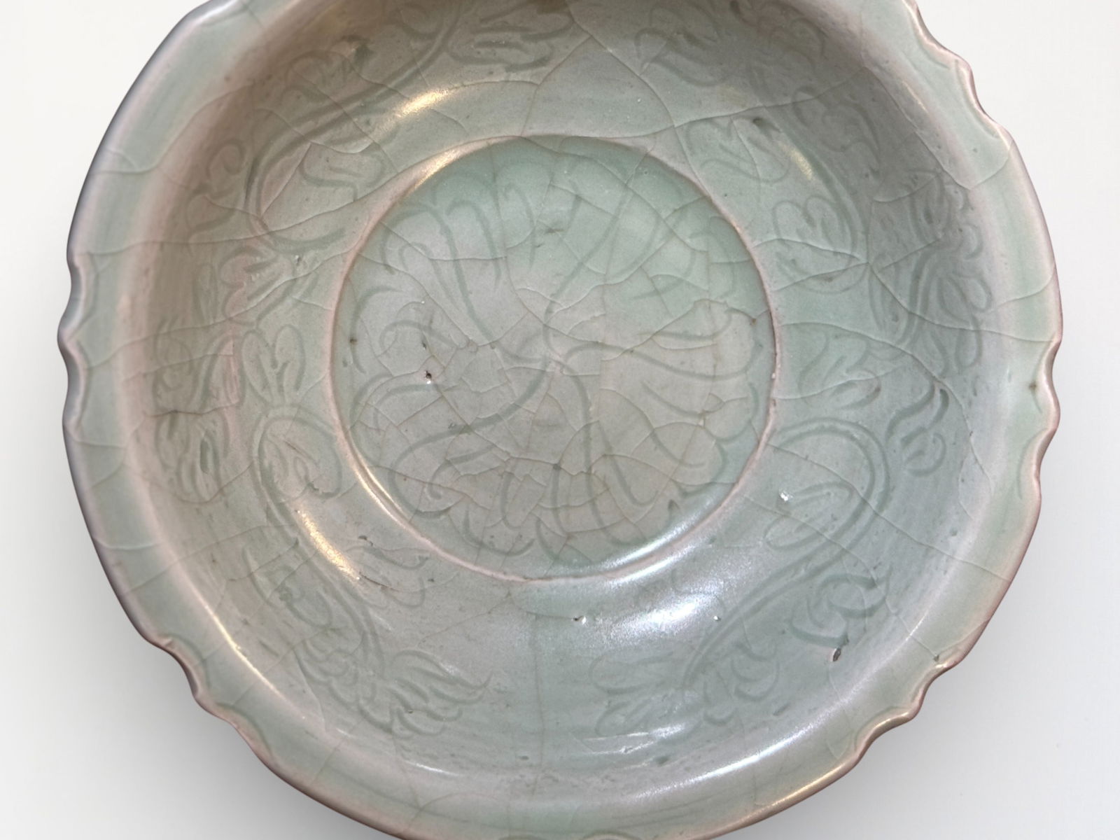 Chinese Celadon Glazed Porcelain Dish: Chinese celadon porcelain bowl with incised décor, 6.75"dia Shipping: We offer in-house shipping services for most small items. This means that we will take care of packing and shipping the items dir