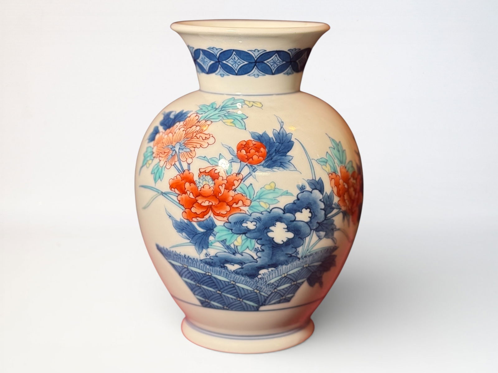 Japanese NABESHIMA-STYLE Porcelain Vase With Floral Motif: Japanese porcelain vase with floral motif, 8.75"ht Shipping: We offer in-house shipping services for most small items. This means that we will take care of packing and shipping the items directly to y