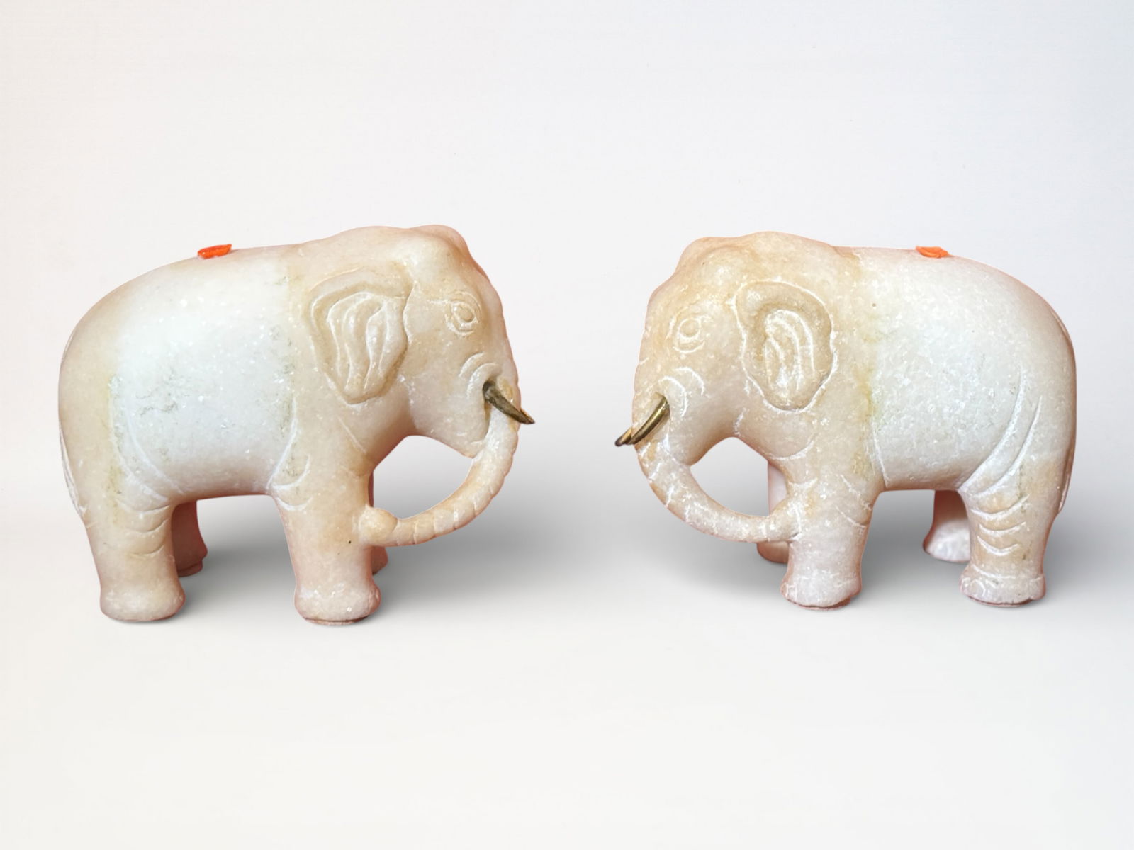 Pair of Chinese Imperial White Marble Elephant With Bronze Tusks: Pair chinese white marble elephant with bronze tusk, 5.5"L 4.25"ht Shipping: We offer in-house shipping services for most small items. This means that we will take care of packing and shipping the ite