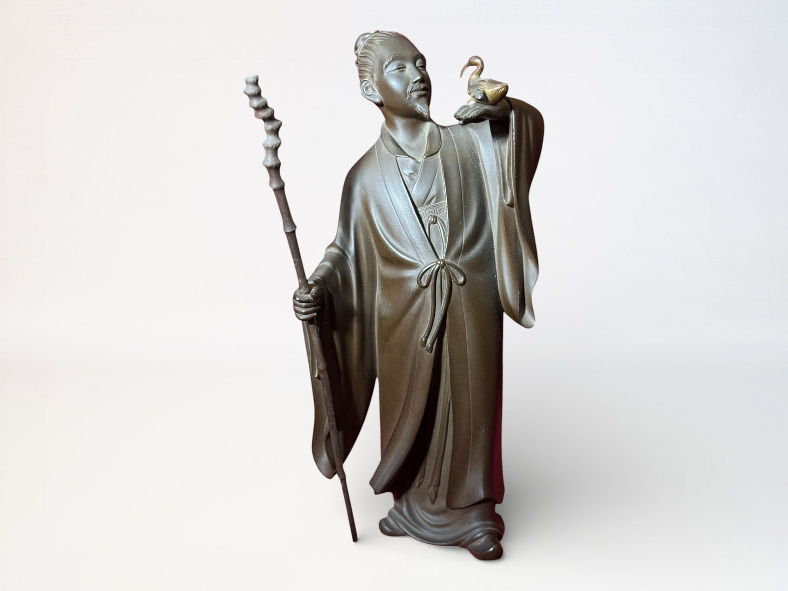 Japanese Meiji Bronze Sage With Bird: Japanese meiji bronze scupture of a scholar with bird on hand, signed, 13"ht Shipping: We offer in-house shipping services for most small items. This means that we will take care of packing and shippi