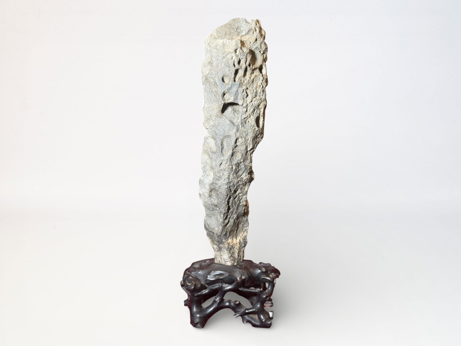 Chinese Scholar's Rock on Wood Stand: Chinese tall scholar rock on stand, 22"ht, heavy in weight Shipping: We offer in-house shipping services for most small items. This means that we will take care of packing and shipping the items direc