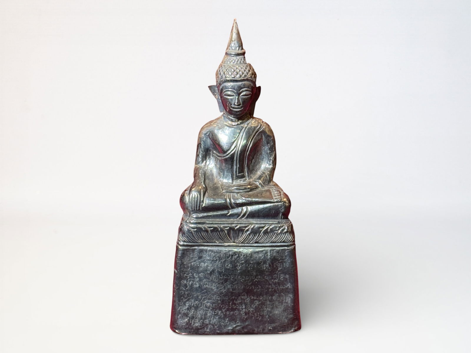 Antique Thai Silver Buddha With Inscription: Antique silver burmese buddha with incised inscriptions, 6.5"ht Shipping: We offer in-house shipping services for most small items. This means that we will take care of packing and shipping the items