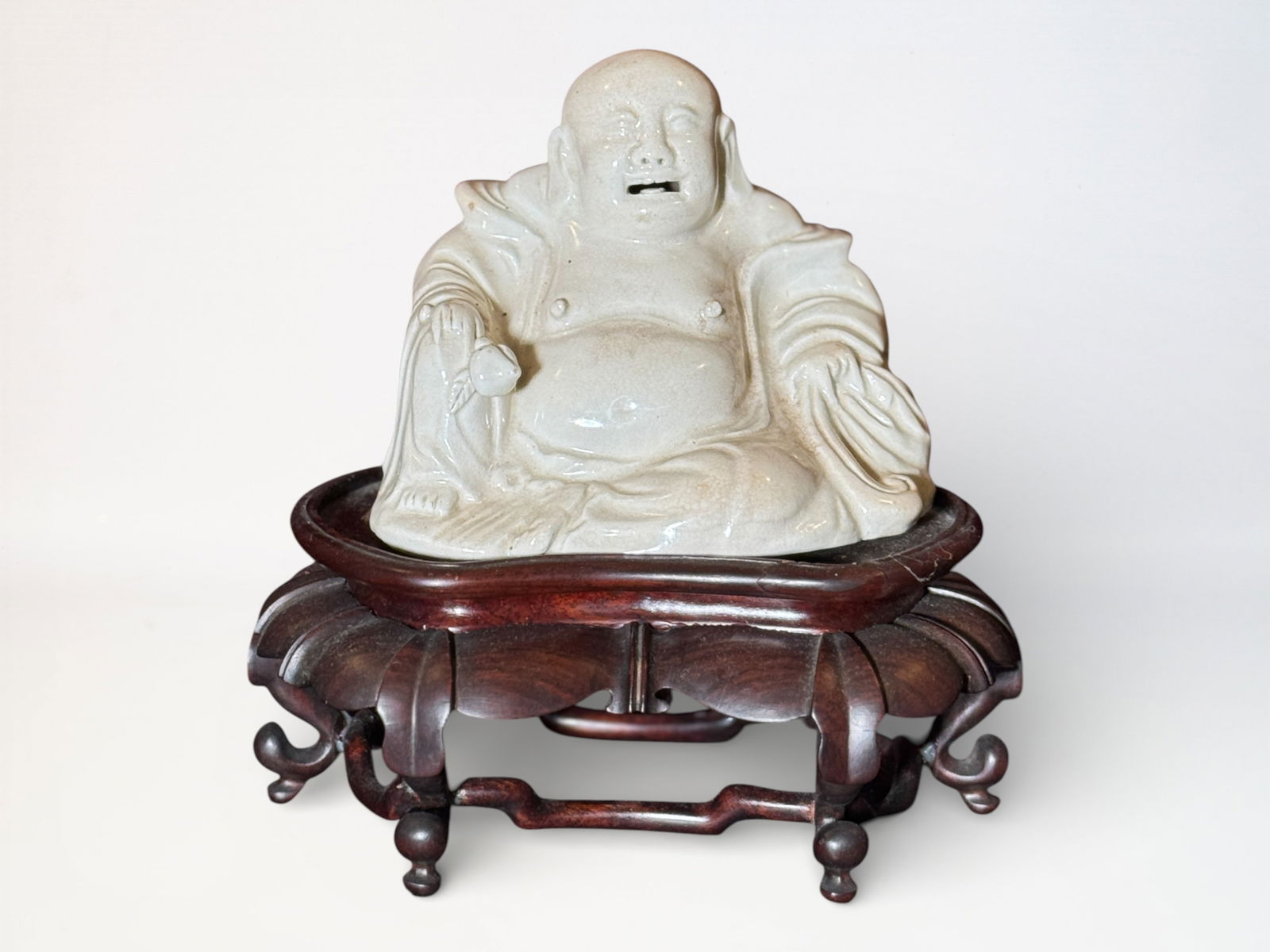 Chinese Zhangzhou Kiln Porcelain Buddha With Wood Stand: Chinese white galzed porcelain happy buddha from zhangzhou kiln, on hardwood stand, porcelain 5"w 5"ht Shipping: We offer in-house shipping services for most small items. This means that we will take