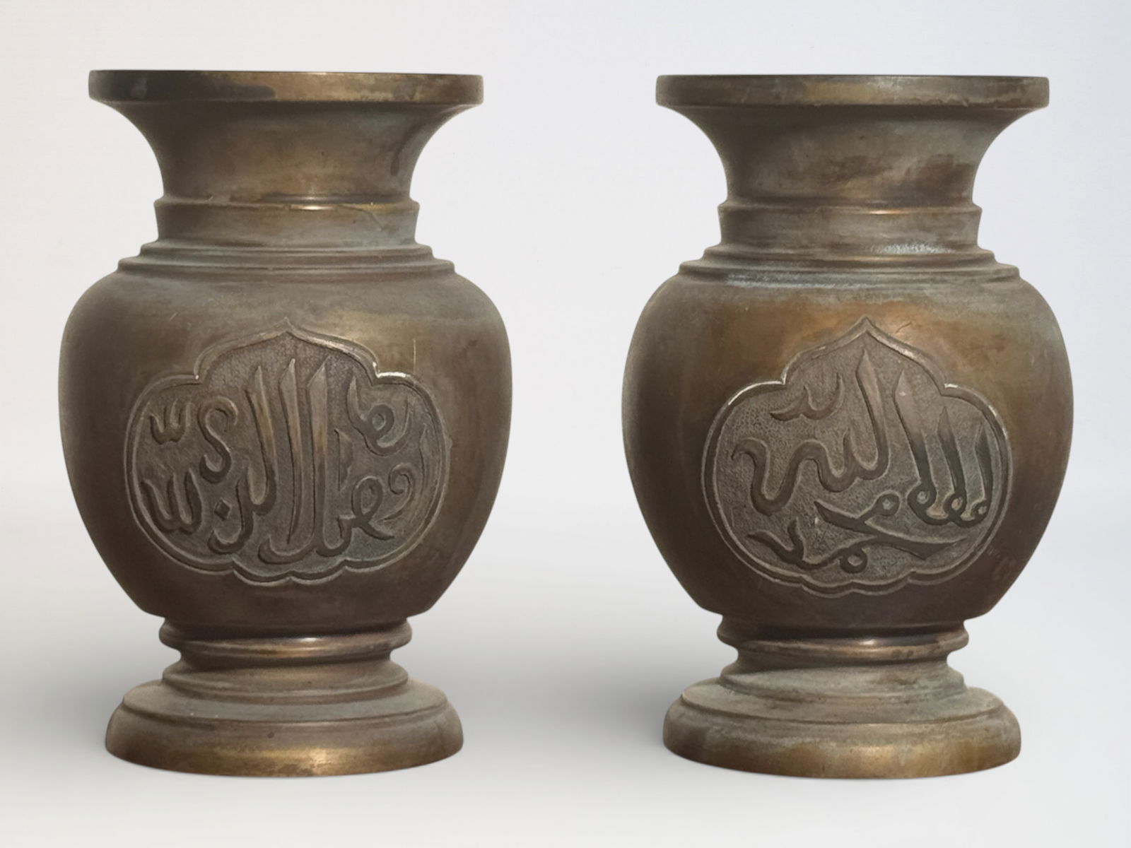 Pair of Chinese Bronze Arabic-Inscribed Vases: Pair chinese bronze vases with arabic script, 5.5"ht Shipping: We offer in-house shipping services for most small items. This means that we will take care of packing and shipping the items directly to