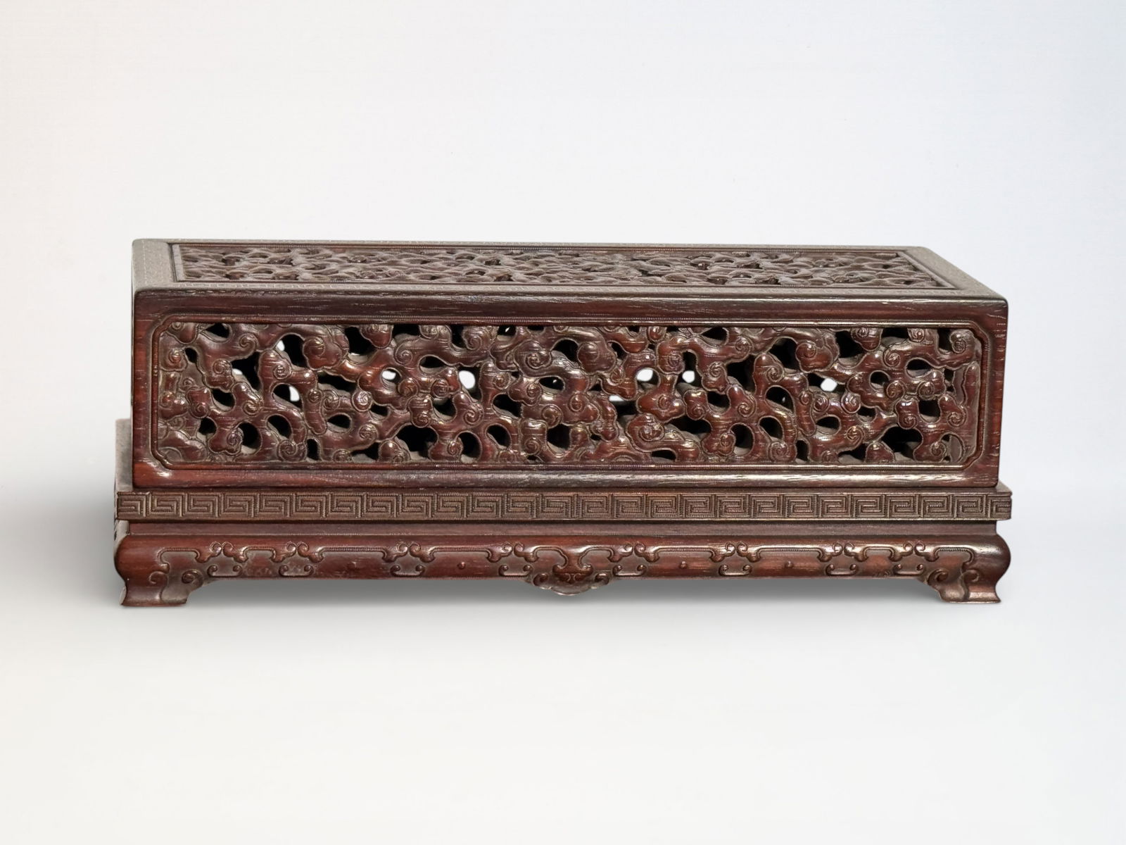 Chinese Zitan Box With Reticulate Cloud Motif: Chinese zitan wood box with reticulate cloud motif, silver wire inlay, 8.7"w 3.25"w and height Shipping: We offer in-house shipping services for most small items. This means that we will take care of