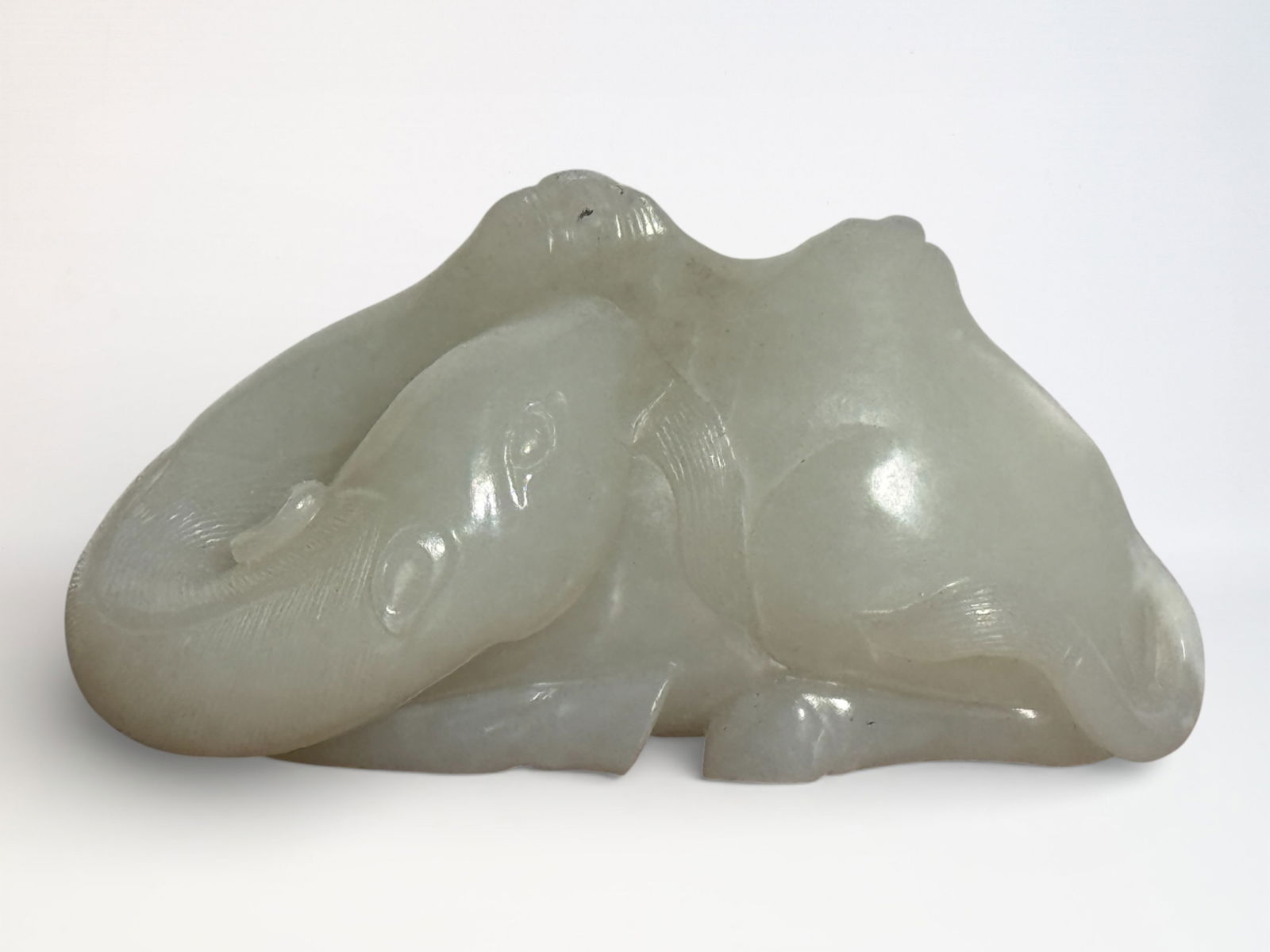 Chinese Carved White Jade Figure of A Camel: Chinese white jade camel, 3.5"L Shipping: We offer in-house shipping services for most small items. This means that we will take care of packing and shipping the items directly to you. For larger or s