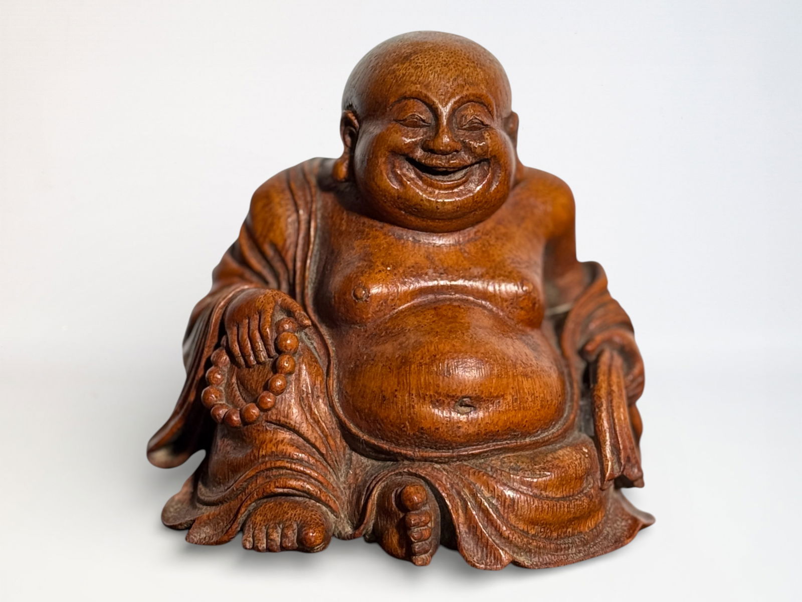 Chinese Carved Bamboo Figure of A Hotei Buddha: Chinese carved bamboo hotei, 4.5"ht Shipping: We offer in-house shipping services for most small items. This means that we will take care of packing and shipping the items directly to you. For larger