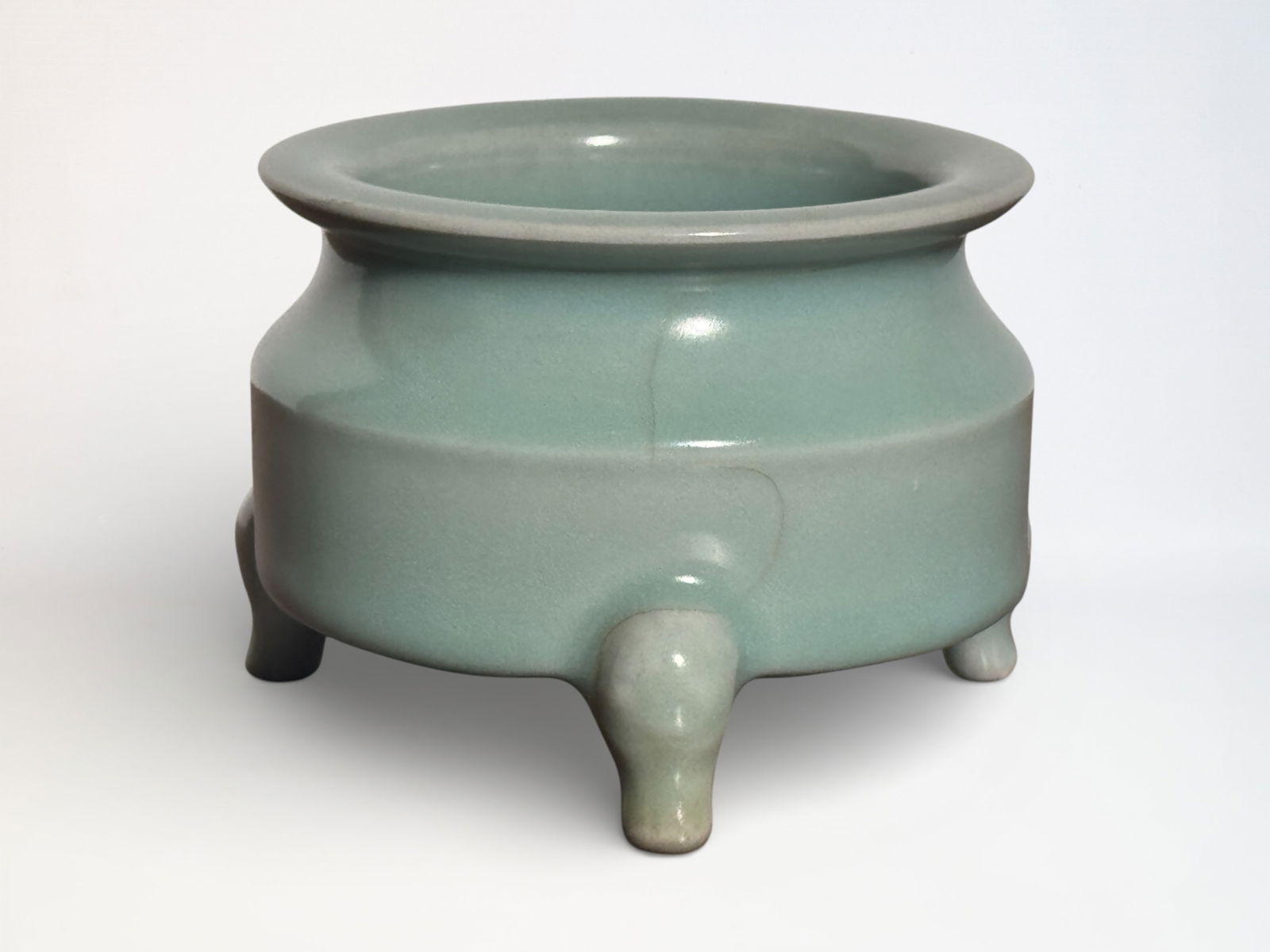 Chinese Celadon Glazed Tripod Censer: Chinese cealdon porcelain censer with tripot foot, 4.7"dia 3.15"ht Shipping: We offer in-house shipping services for most small items. This means that we will take care of packing and shipping the ite