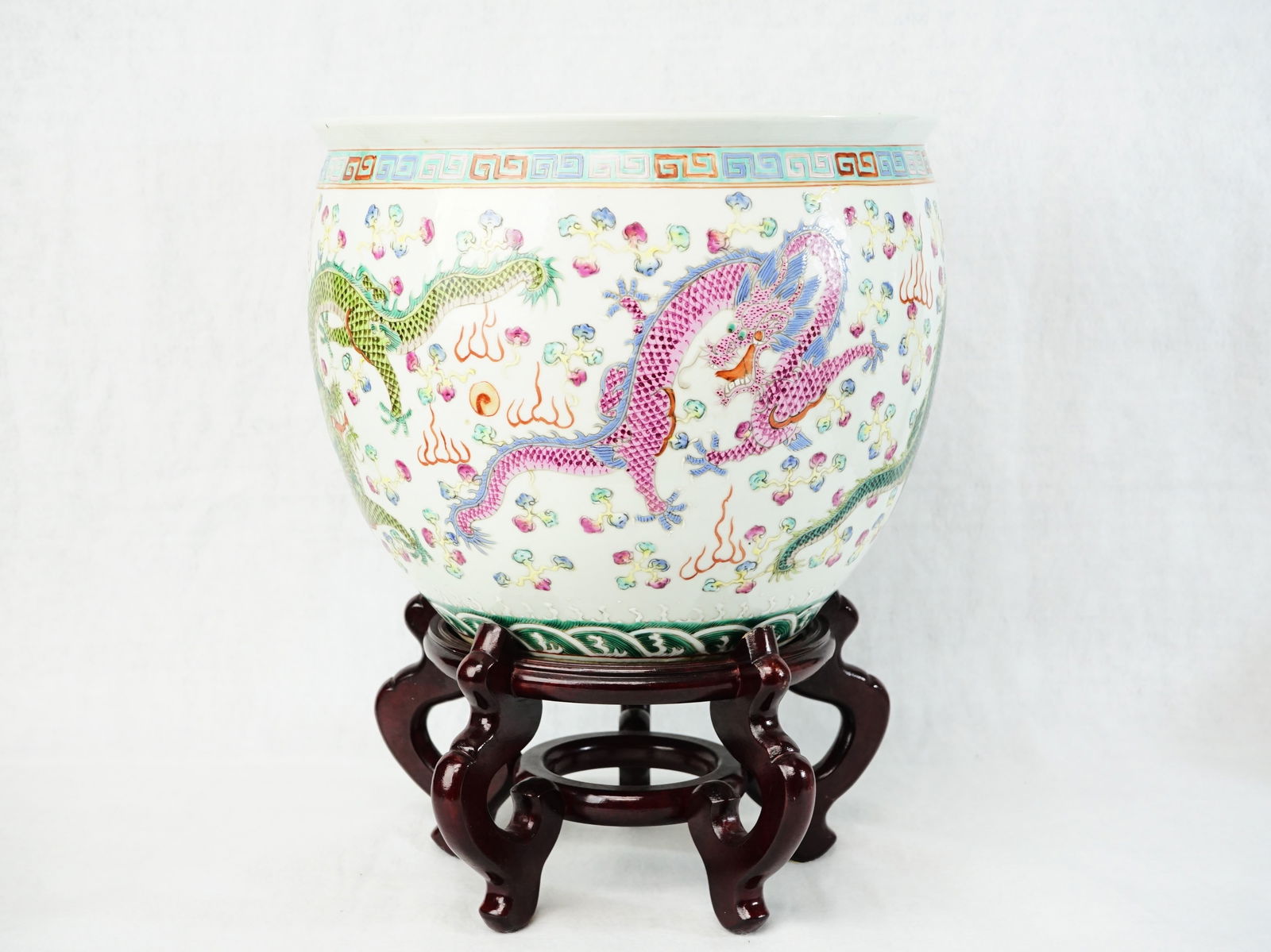 Chinese Famille Rose 'Dragon' Jardiniere: Approximate size:10.5x10.5x8.5 in Shipping: We offer in-house shipping services for most small items. This means that we will take care of packing and shipping the items directly to you. For larger or