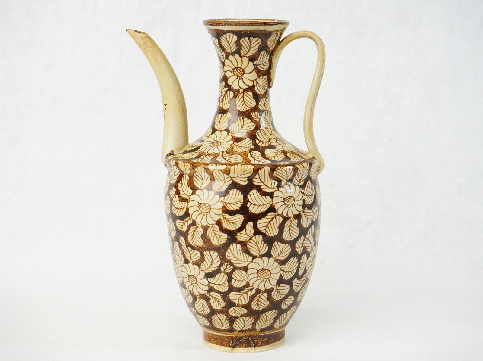 Chinese Jizhou Kiln Porcelain Ewer: Approximate size:9.25x5.5x4.25 in Shipping: We offer in-house shipping services for most small items. This means that we will take care of packing and shipping the items directly to you. For larger or