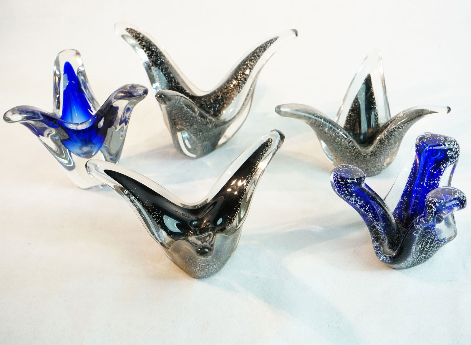 Lot of Five Blue and Black Glass Bowl: Approximate size: largest 5x8x8 in /smallest 3.5x4.5x4.5 in Shipping: We offer in-house shipping services for most small items. This means that we will take care of packing and shipping the items dire