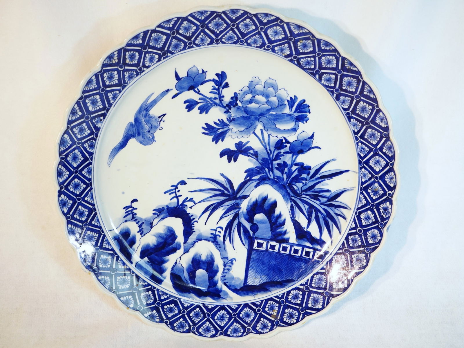 Japanese Arita Ware Large Charger: Approximate size:2.5x17.75x17.75 in Shipping: We offer in-house shipping services for most small items. This means that we will take care of packing and shipping the items directly to you. For larger