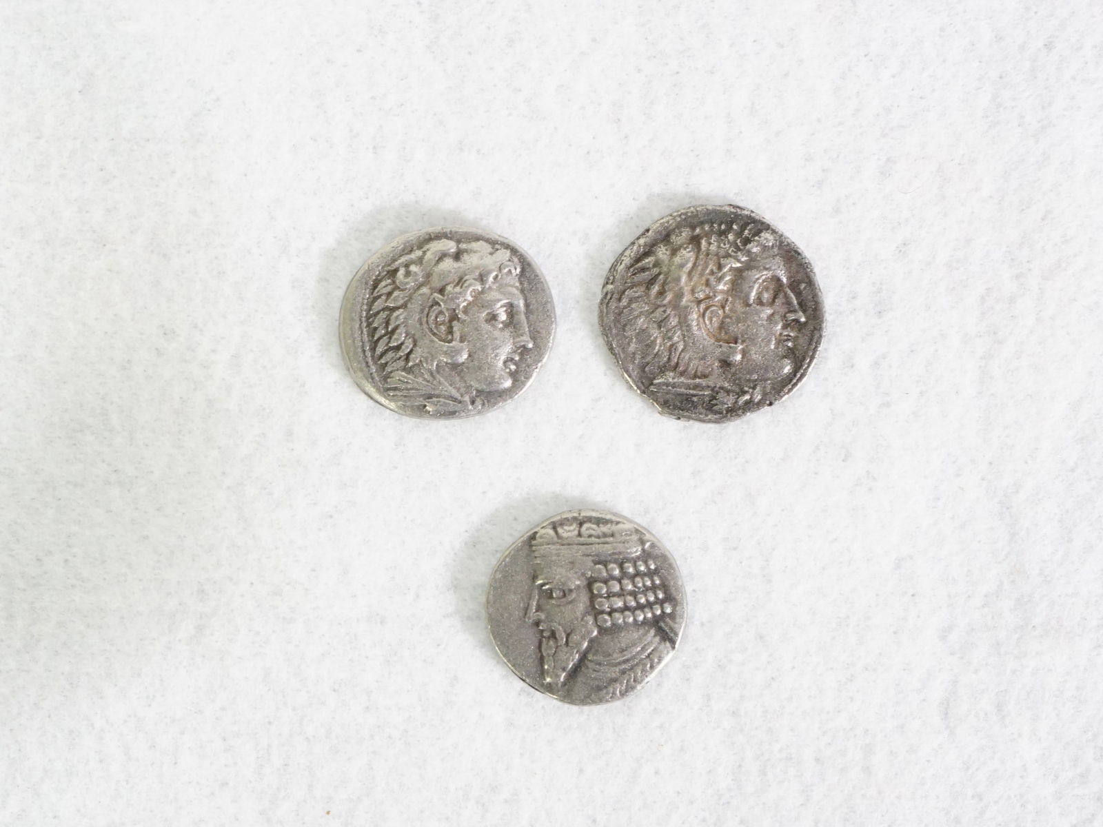 Three Silver Ancient Coins: Approximate size:dia 1 in Shipping: We offer in-house shipping services for most small items. This means that we will take care of packing and shipping the items directly to you. For larger or