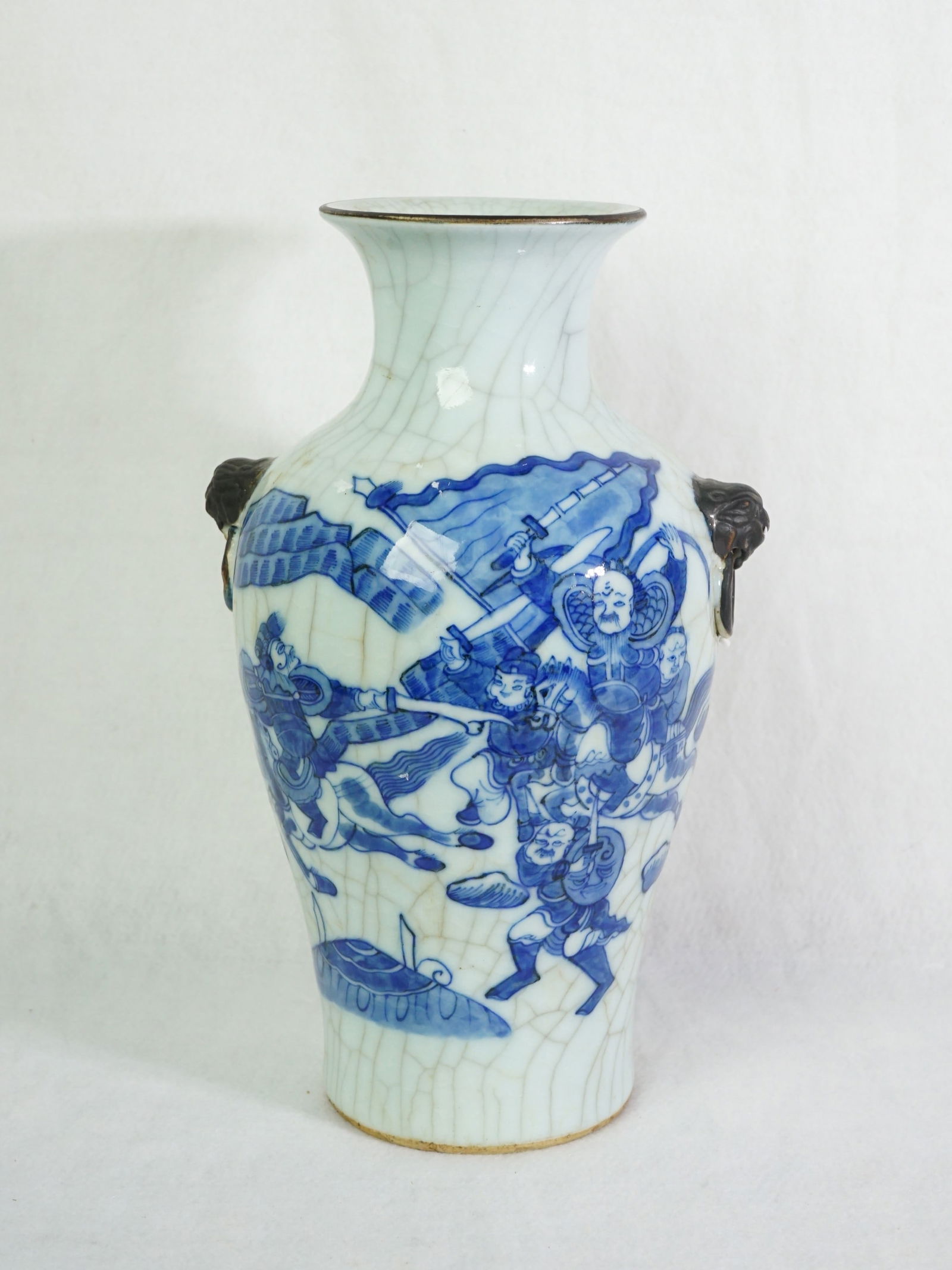 Chinese Blue and White Crackle-Glazed Baluster Vase with Warrior Scene: Approximate size: 10.5x6.5x5.5 in Shipping: We offer in-house shipping services for most small items. This means that we will take care of packing and shipping the items directly to you. For larger