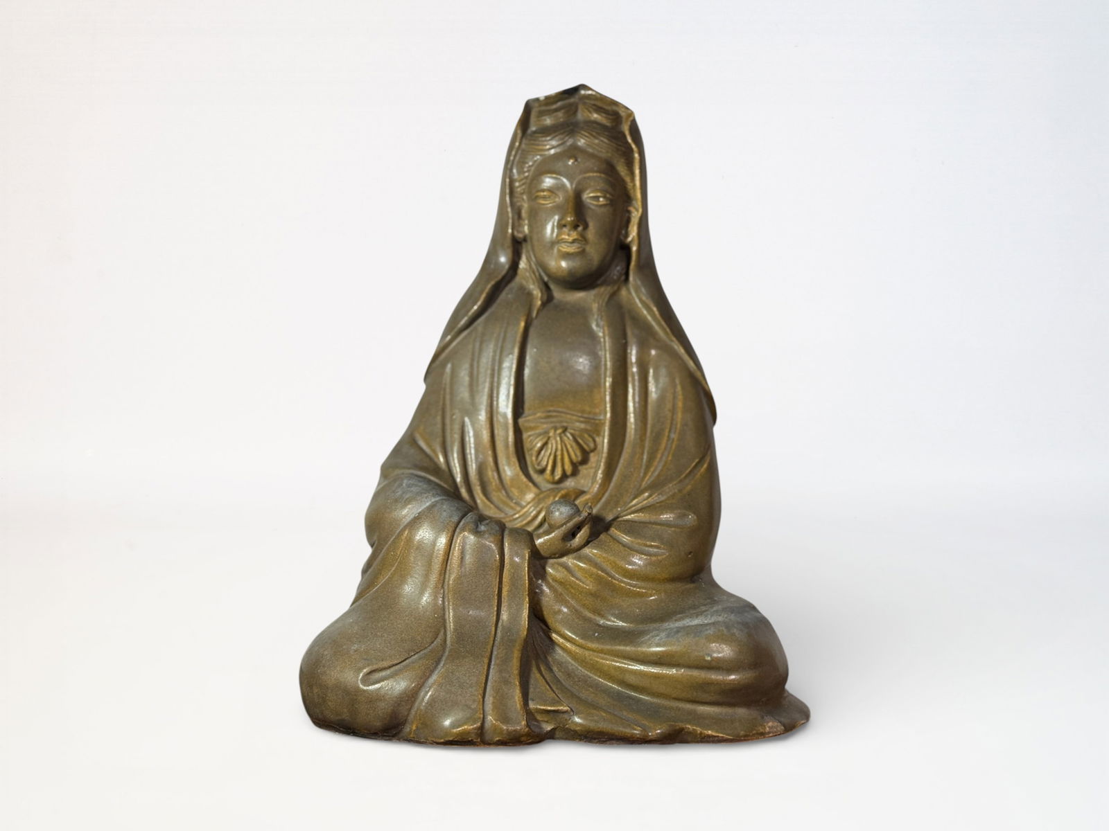 Chinese Porcelain Kuanyin with Teadust Glaze: Chinese seated porcelain kuanyin with tea dust glaze, 13.5"ht Shipping: We offer in-house shipping services for most small items. This means that we will take care of packing and shipping the items di