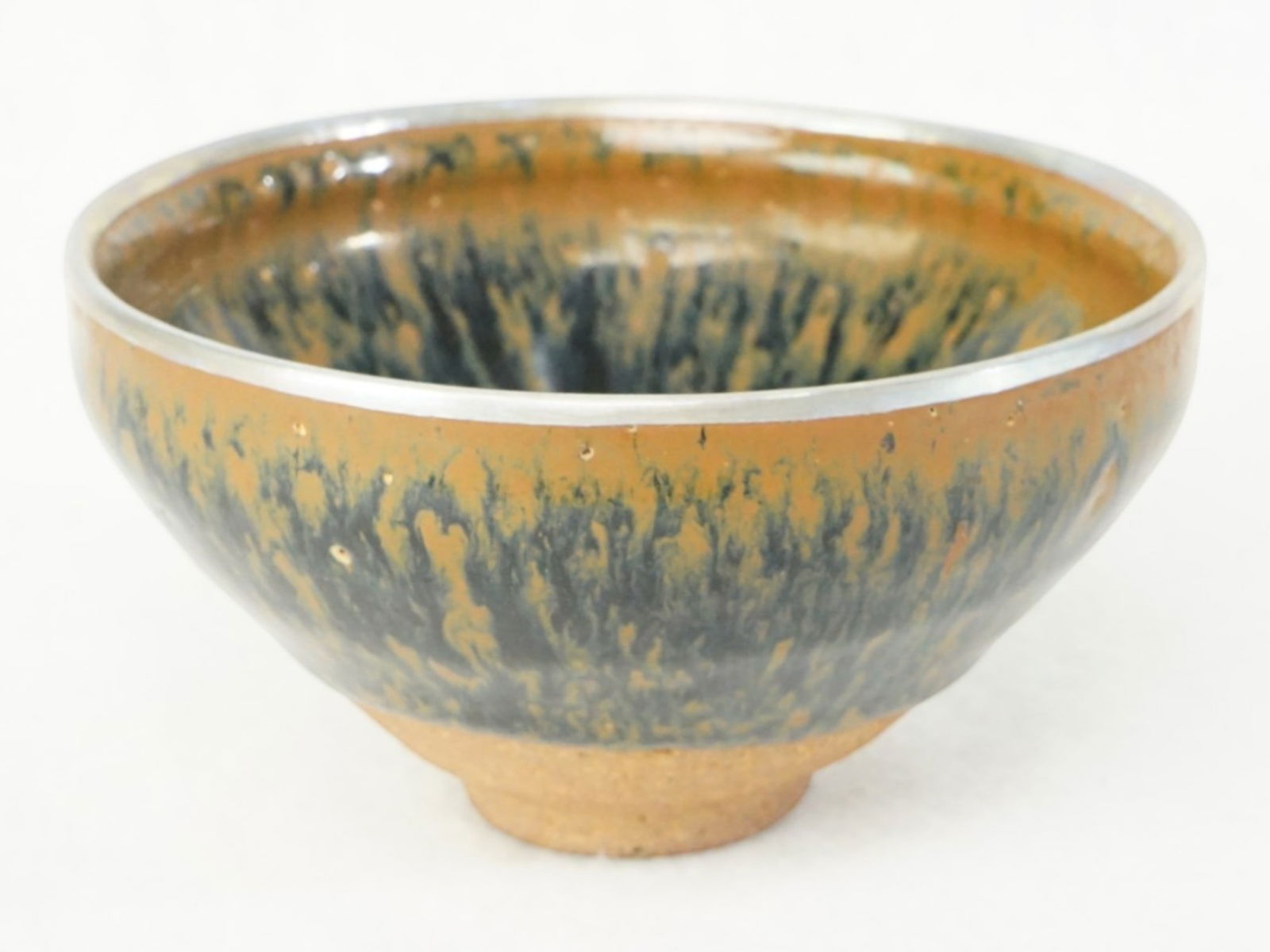 Chinese Jian ’Hare’S Fur’ Tenmoku Tea Bowl with Silver-Mounted Rim: Approximate size: 2.75x4.75x4.75 in Shipping: We offer in-house shipping services for most small items. This means that we will take care of packing and shipping the items directly to you. For