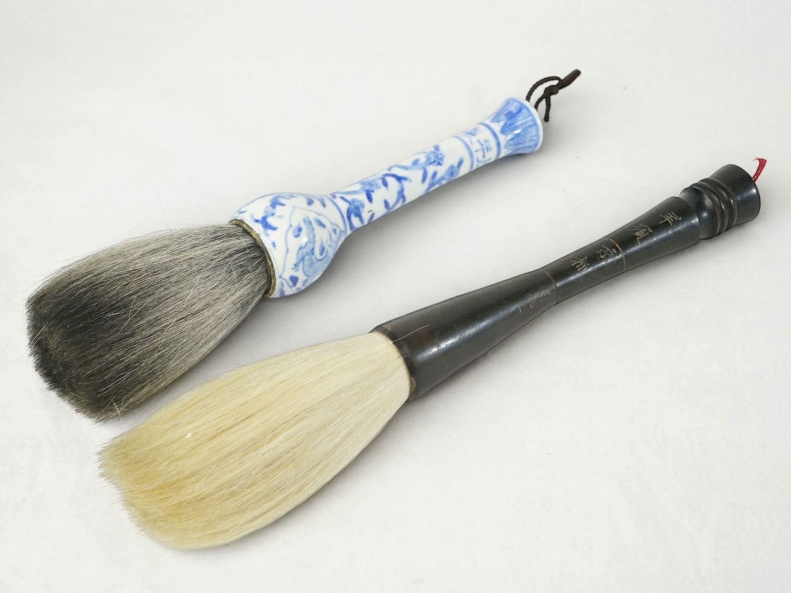Chinese Underglaze Blue-Handled and Wood-Handle Brushes: Approximate size:L: 12 in ,10.5 in Shipping: We offer in-house shipping services for most small items. This means that we will take care of packing and shipping the items directly to you. For larger