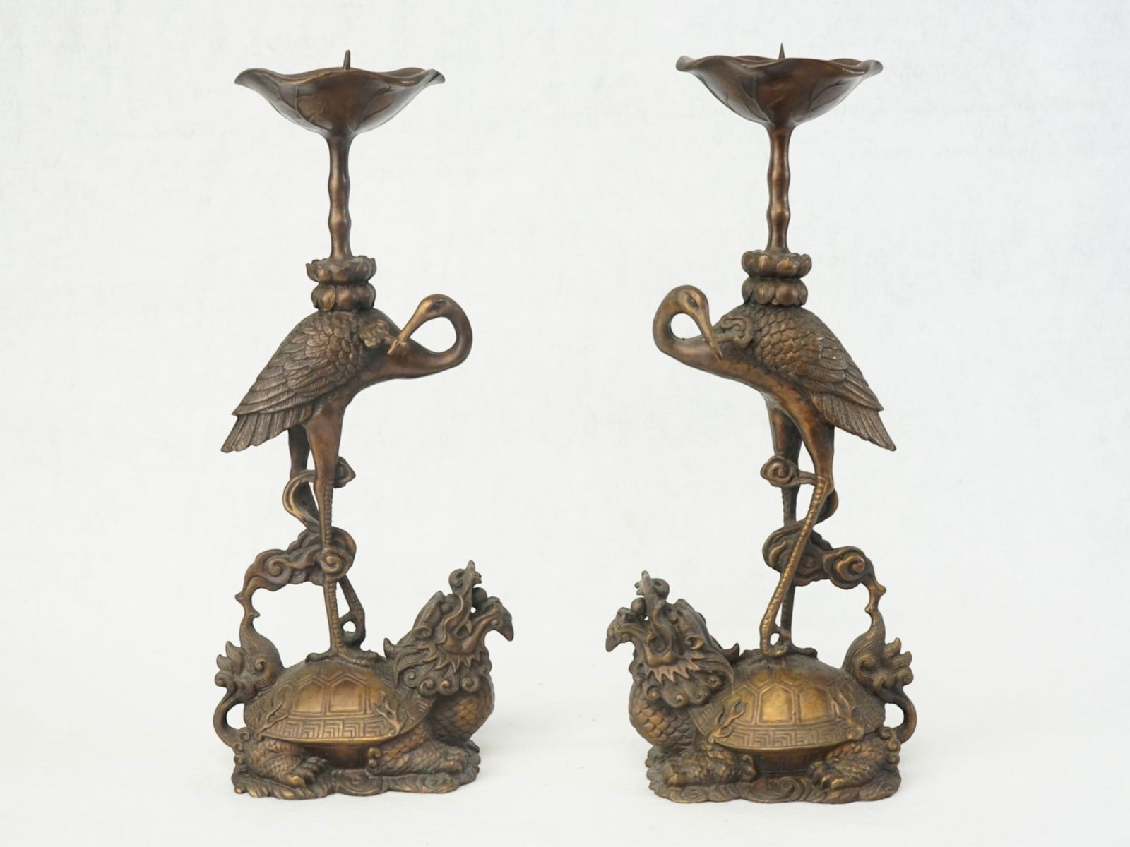 Pair of Chinese Bronze Candlesticks with Crane and Dragon Turtle: Approximate size: H:11 in Shipping: We offer in-house shipping services for most small items. This means that we will take care of packing and shipping the items directly to you. For larger or