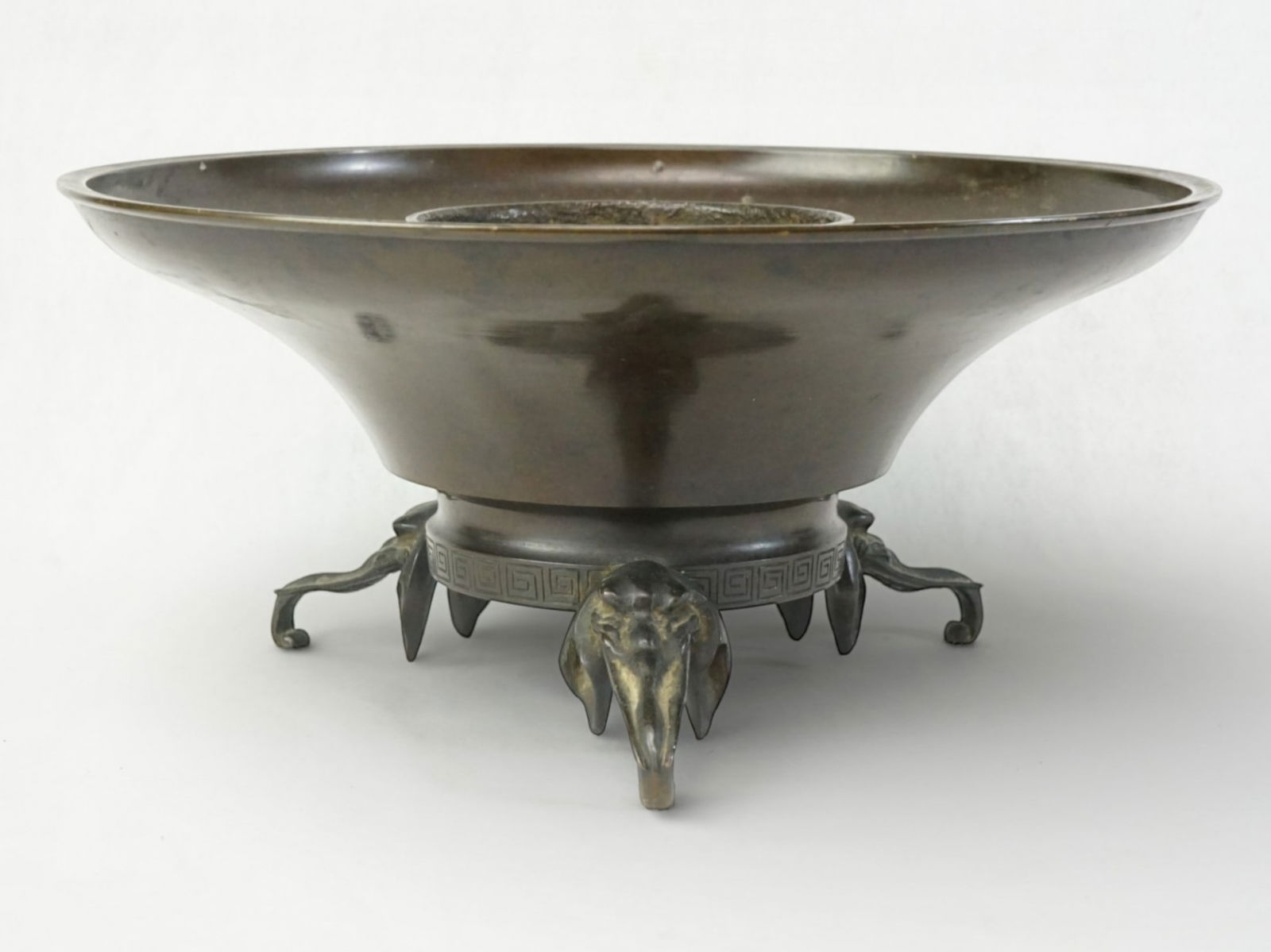 Japanese Meiji Bronze Ikebana with Elephant Foot: Approximate size:5x11x11 in Shipping: We offer in-house shipping services for most small items. This means that we will take care of packing and shipping the items directly to you. For larger or speci