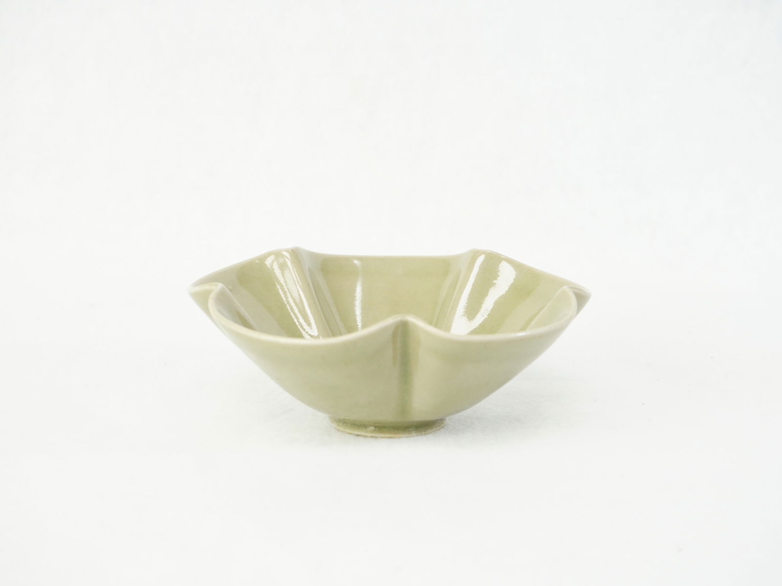 Chinese Yaozhou Celadon Flower Shaped Bowl: Approximate size: dia 5 in Shipping: We offer in-house shipping services for most small items. This means that we will take care of packing and shipping the items directly to you. For larger or
