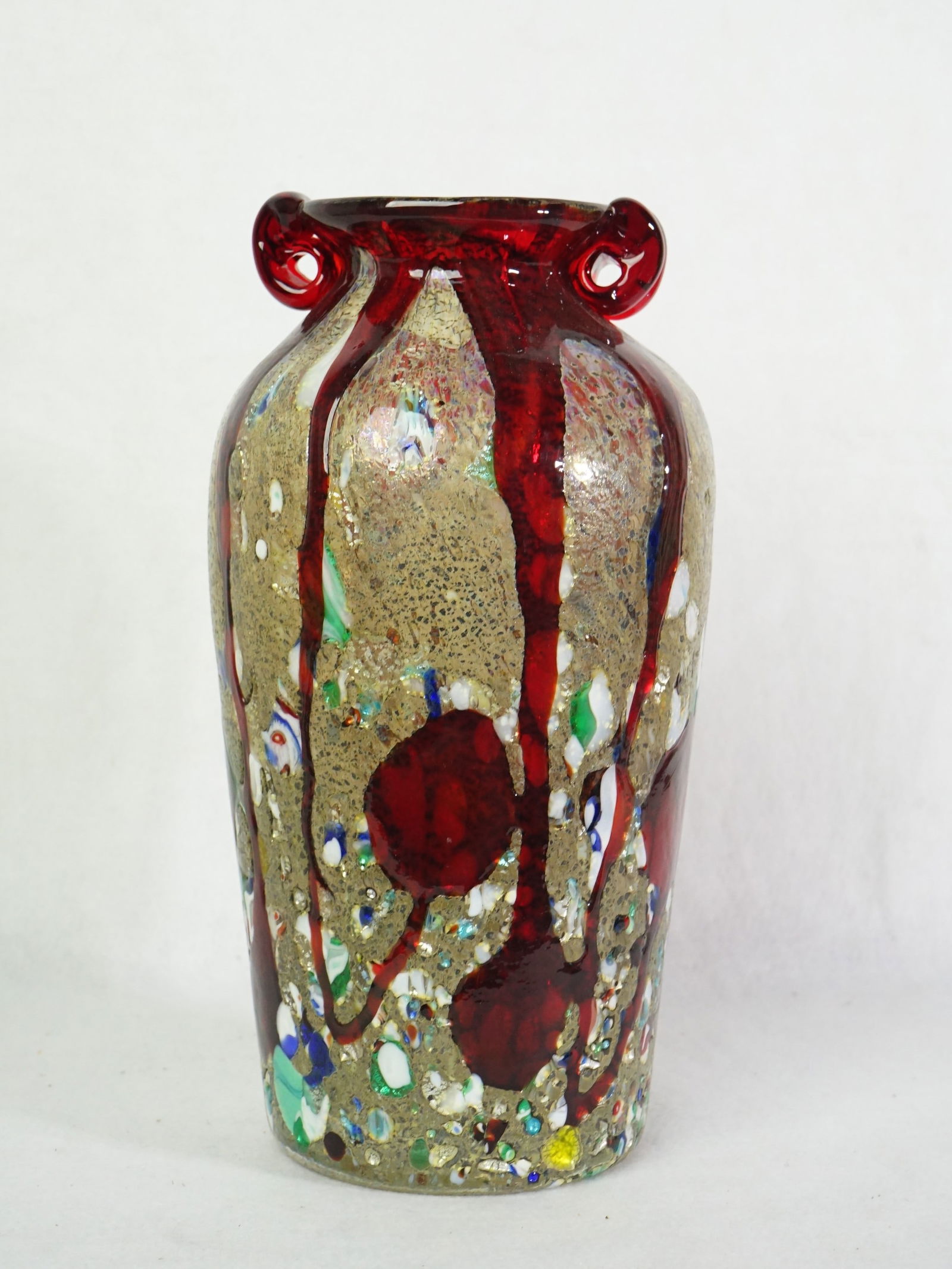 Murano Glass Vase with Aventurine and Red Overlay: Approximate size: 12x5x5 in Shipping: We offer in-house shipping services for most small items. This means that we will take care of packing and shipping the items directly to you. For larger or