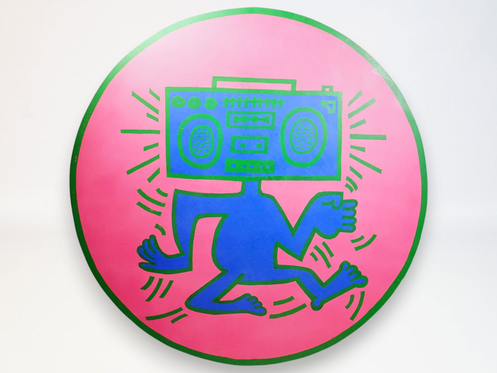 After Keith Haring - Large Radio Man Oil on Plywood: Approximate size: dia 47 in Shipping: We offer in-house shipping services for most small items. This means that we will take care of packing and shipping the items directly to you. For larger or