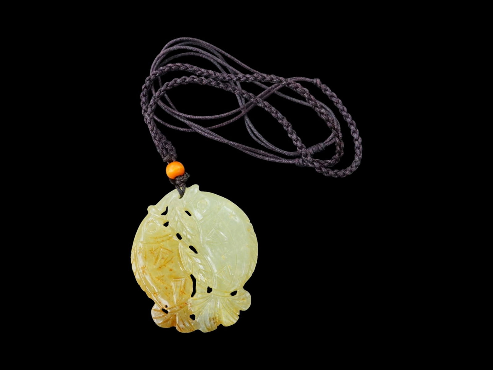 Chinese Carved Yellow and Brown Jade 'Two Fish' Pendant: Approximate size: 1.5x1.75x0.25 in Shipping: We offer in-house shipping services for most small items. This means that we will take care of packing and shipping the items directly to you. For larger