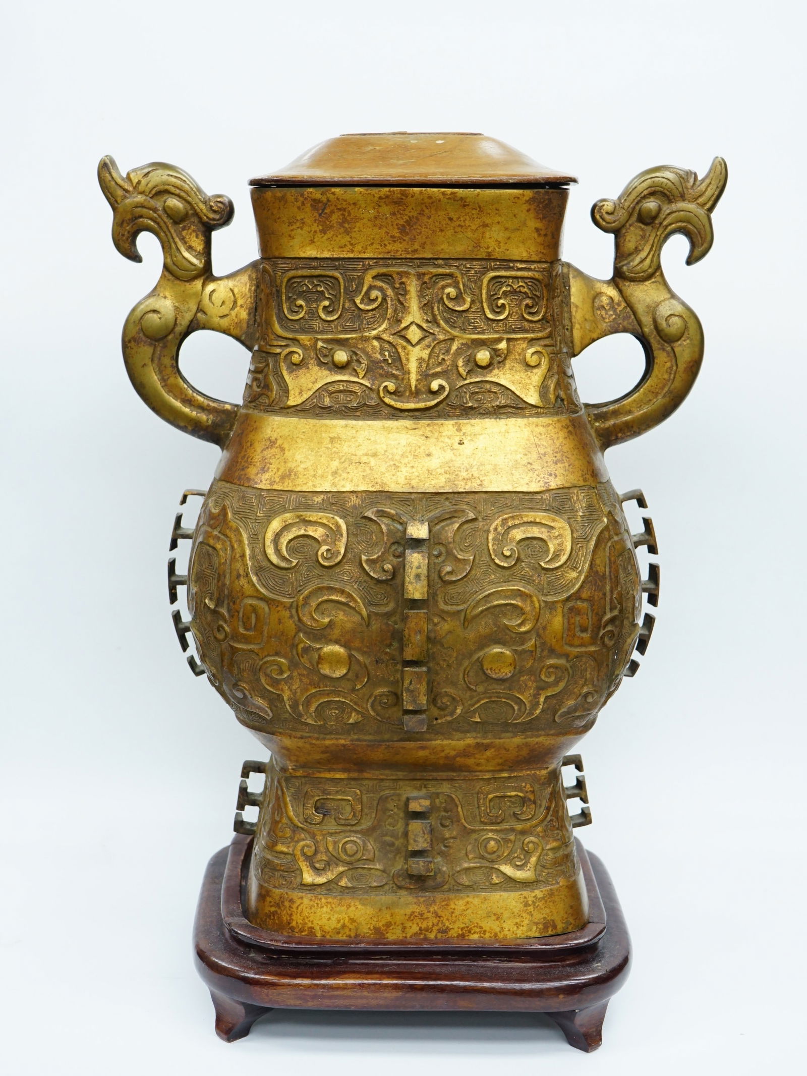 Chinese Gilt Bronze Urn Jardiniere with Dragon-Form Handles: Approximate size: Overall:18x13x11 in Shipping: We offer in-house shipping services for most small items. This means that we will take care of packing and shipping the items directly to you. For