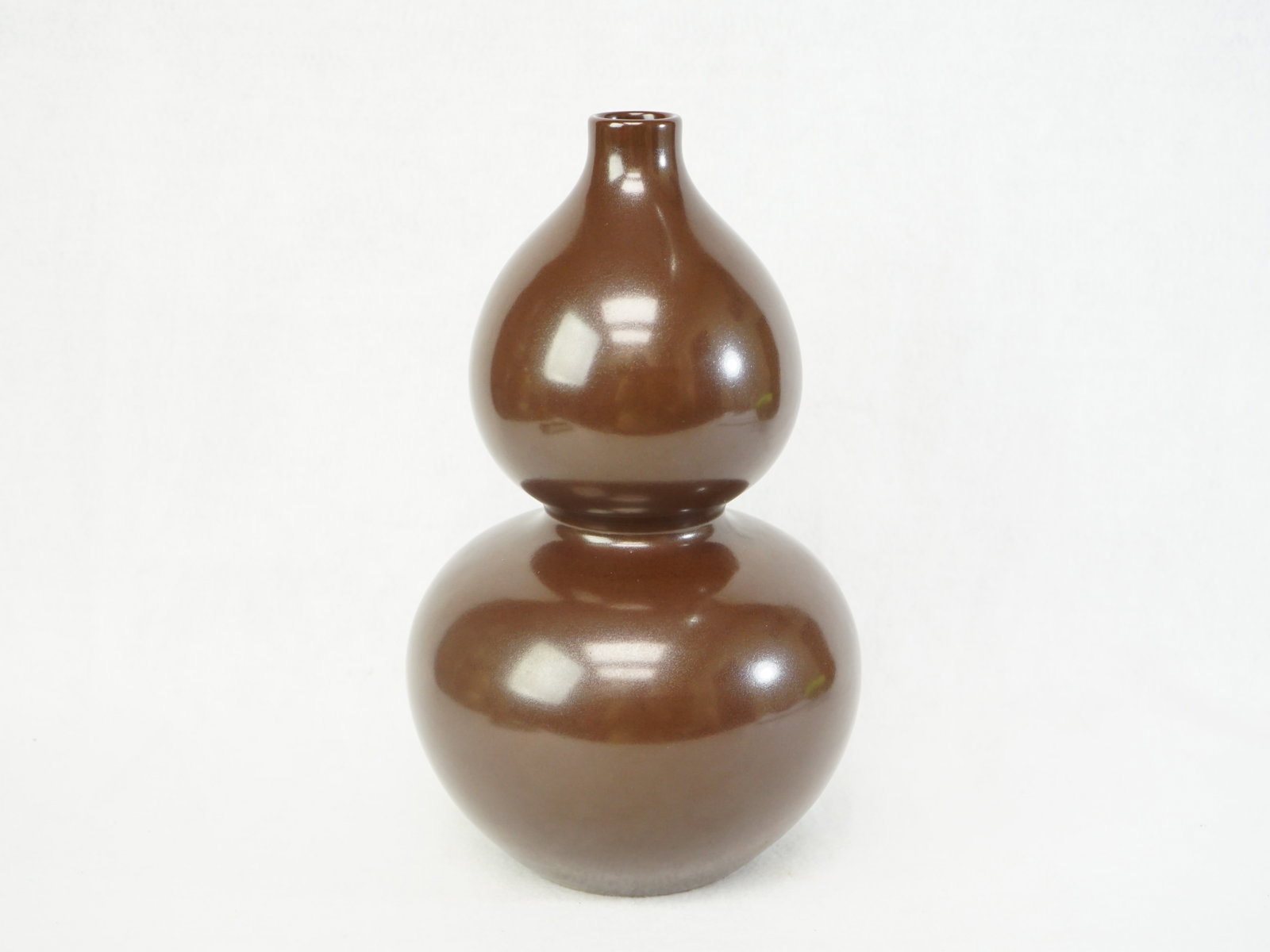 Chinese Cafe-Au-Lait Glazed Double Gourd Vase with Mark: Approximate size:H:10.25 in Shipping: We offer in-house shipping services for most small items. This means that we will take care of packing and shipping the items directly to you. For larger or speci